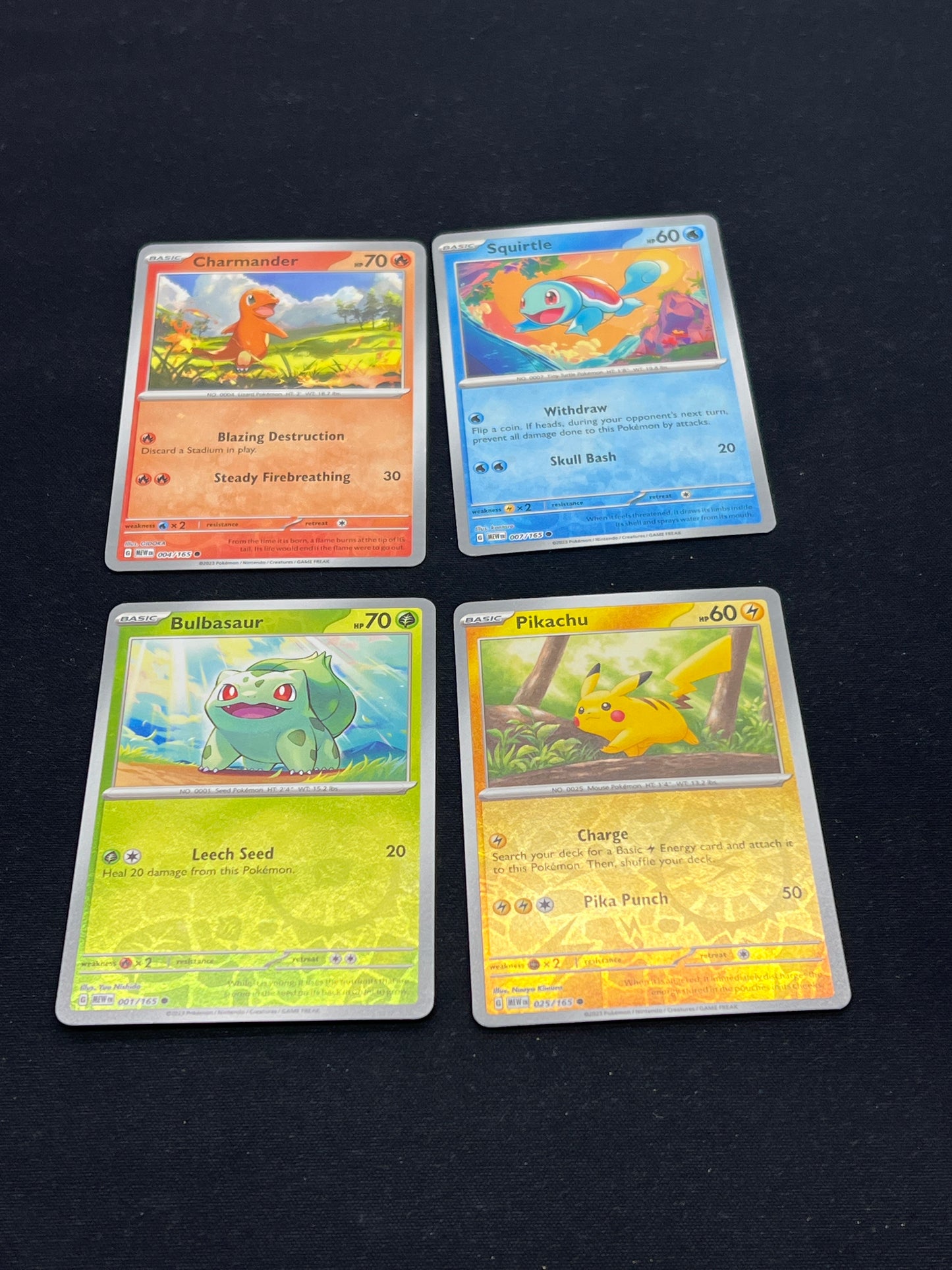 Auction Lot 318: Pokemon Cards Lot of 4 Kanto Starters 151 Tin Promos Conditions Vary