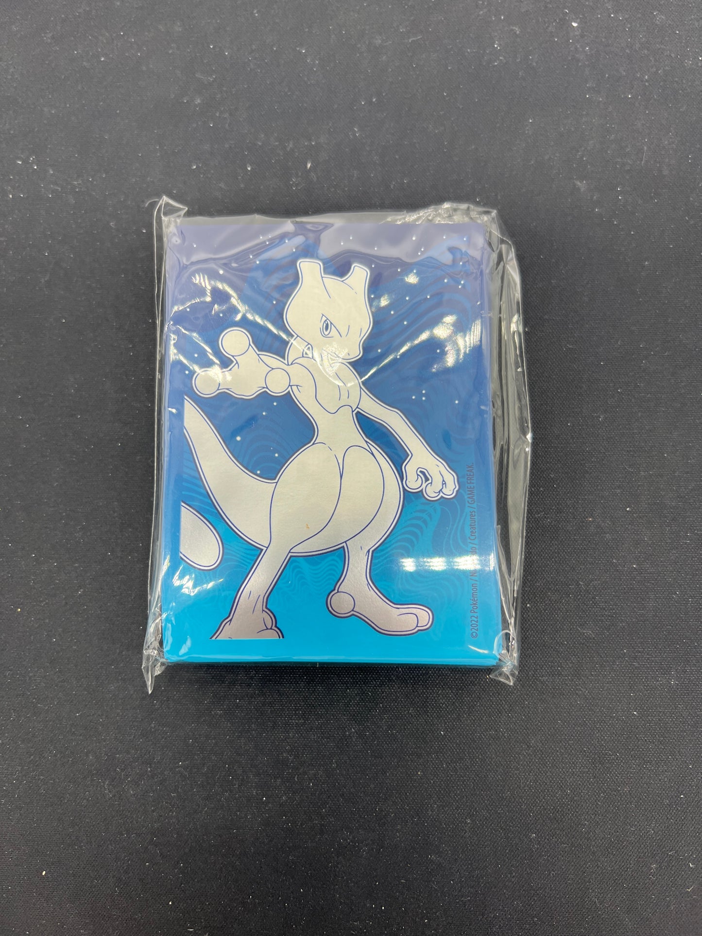 Auction Lot 371: Pokemon SWSH Pokemon GO Mewtwo ETB Card Sleeves Unused