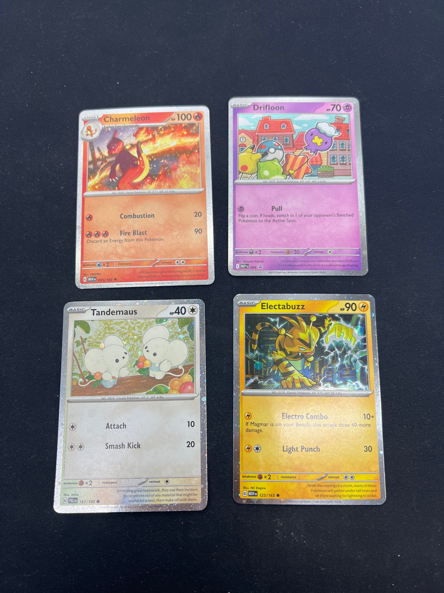 Auction Lot 352: Pokemon Cards Assorted Lot of 4 SV Era Cosmo Holos Lot Condition Vary