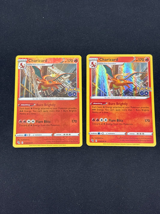 Auction Lot 358: Pokemon Cards Lot of 2 Charizard Holo Rare Reverse Holo Pokemon Go Condition Vary