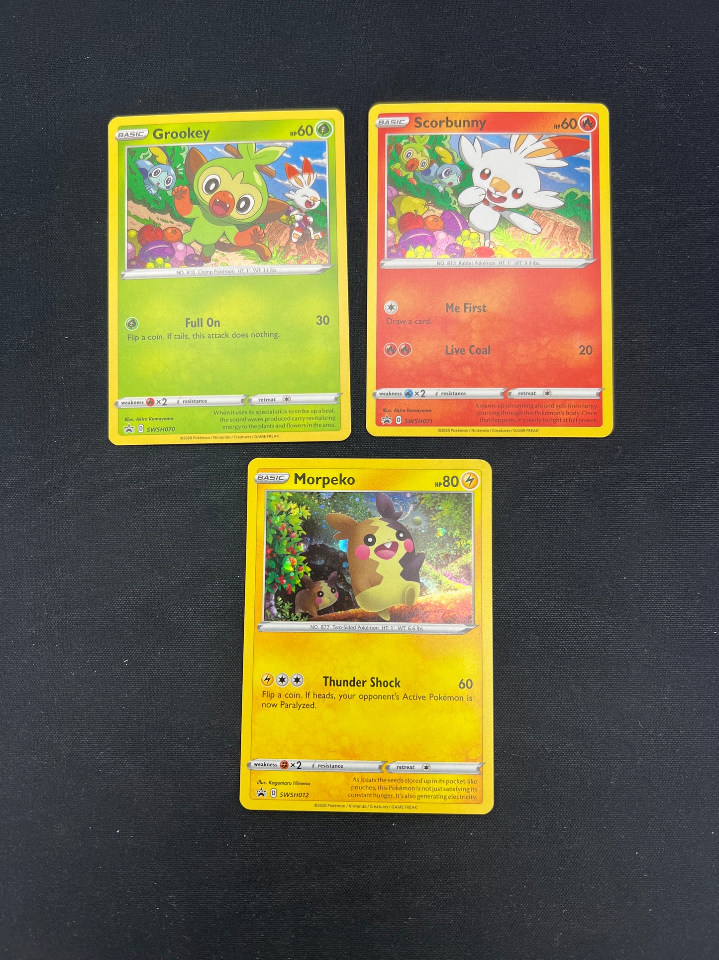 Auction Lot 209: Pokemon Cards Lot of 3 Assorted Cosmo Holo SWSH Promo Conditions Vary