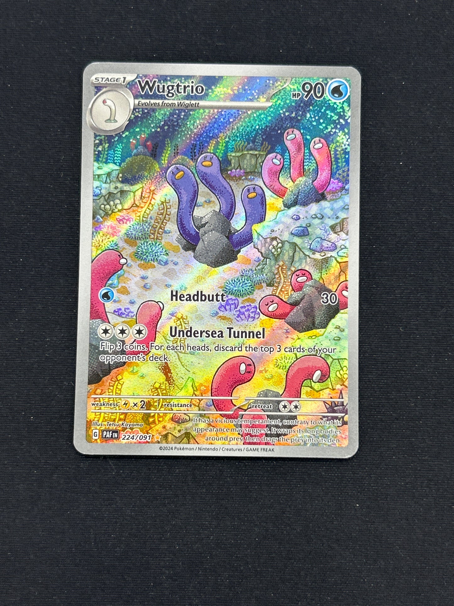 Auction Lot 452: Pokemon Card Wugtrio IR Paldean Fates Conditions Vary