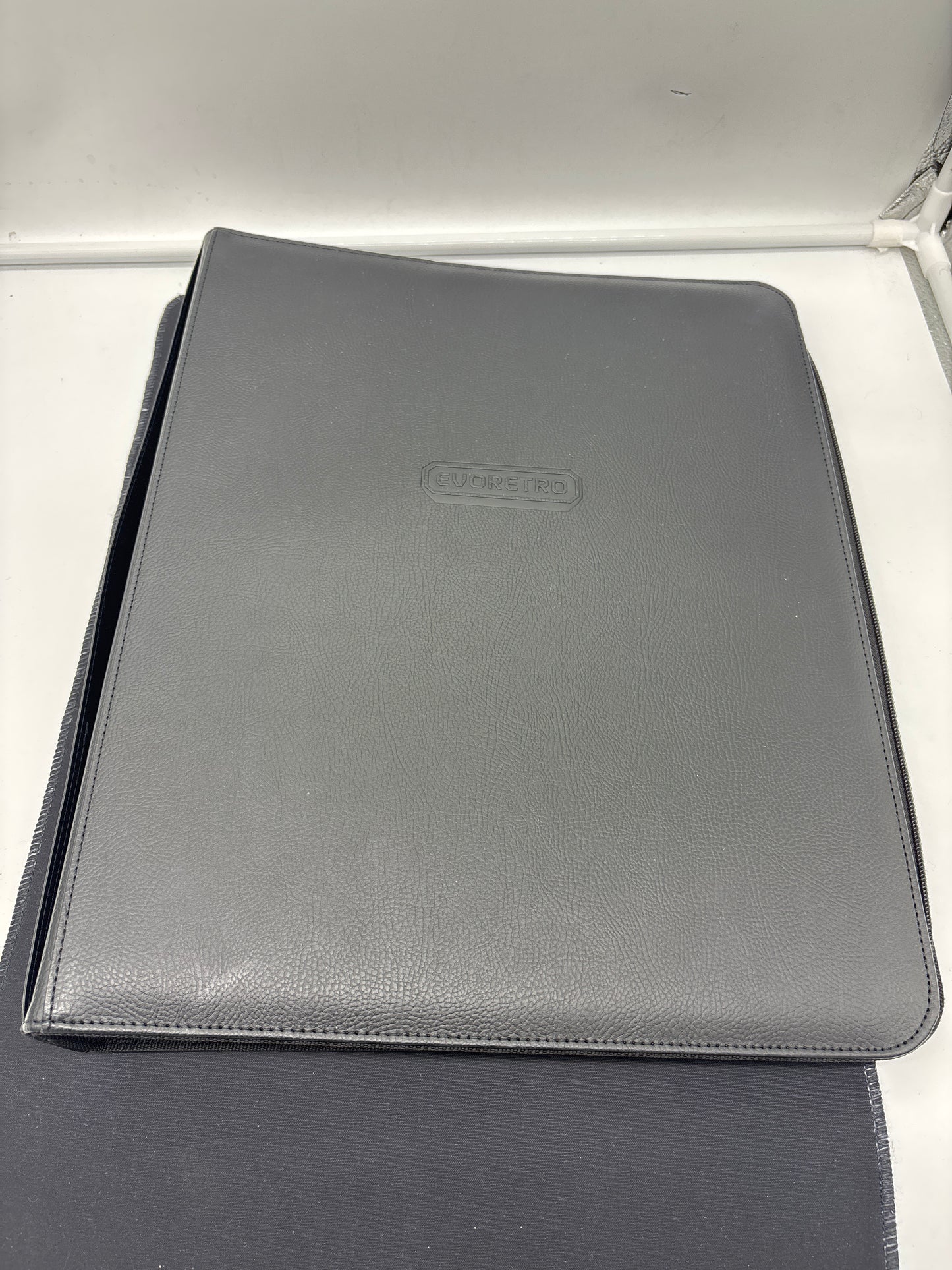 Auction Lot 350: EvoRetro 9 Pocket Toploader 216 Count Binder Rarely Used