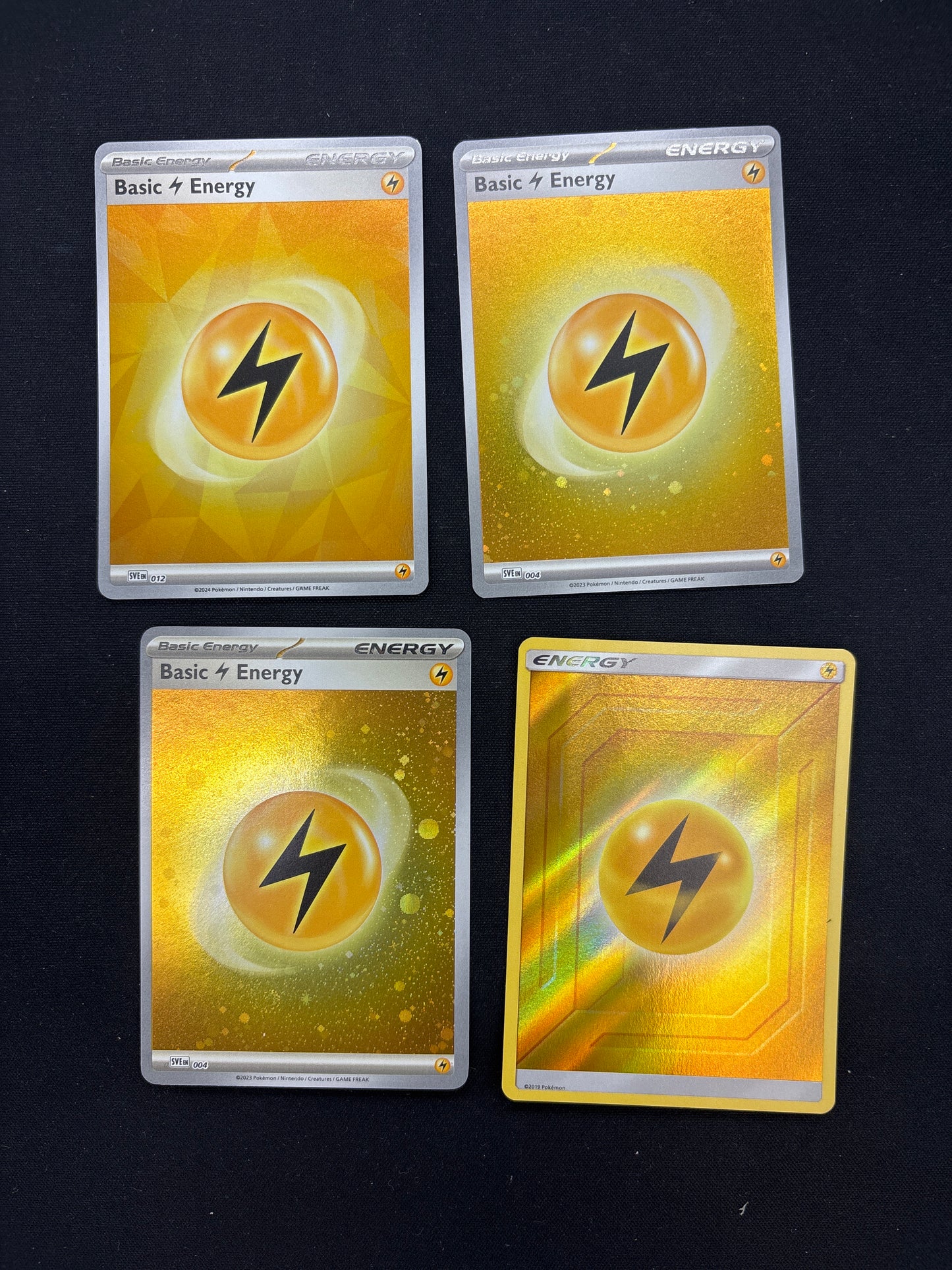 Auction Lot 259: Lightning Energy Holo Card Lot Conditions Vary
