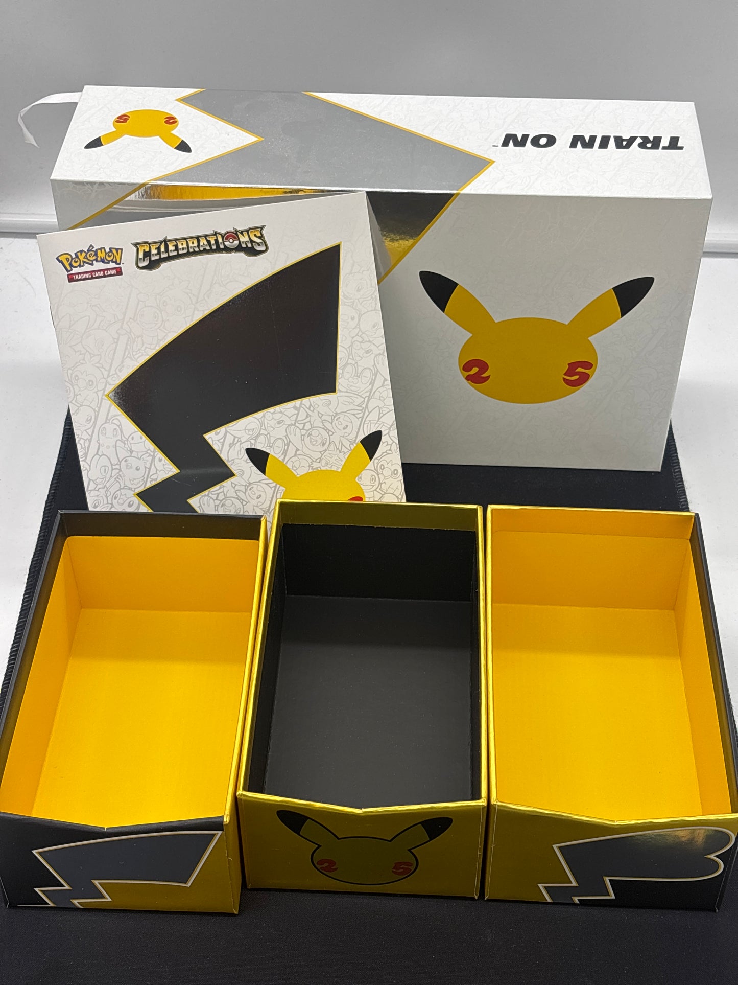 Auction Lot 213: Pokemon Celebrations UPC Empty Box With Player Guide