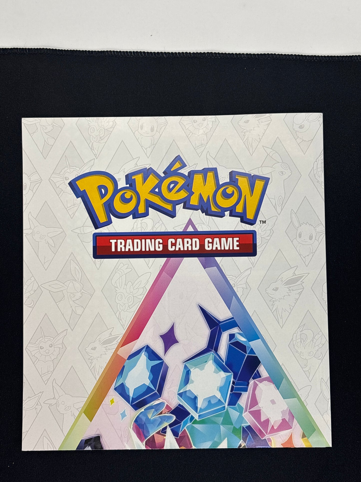Auction Lot 7: Prismatic Evolutions Eevee poster