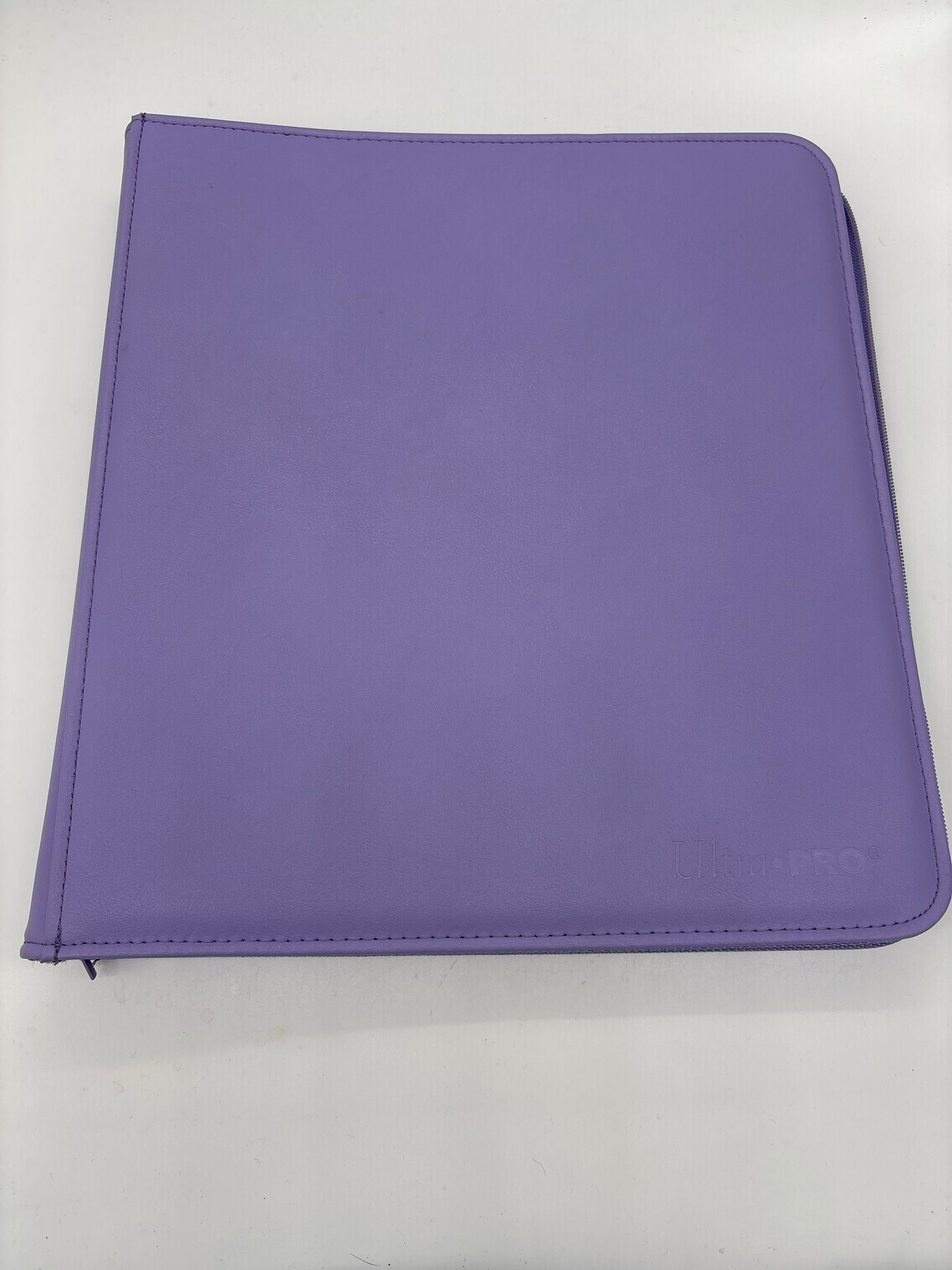 Auction Lot 99: UltraPro Light Purple 16 Pocket Zipper TCG Binder Lightly Used