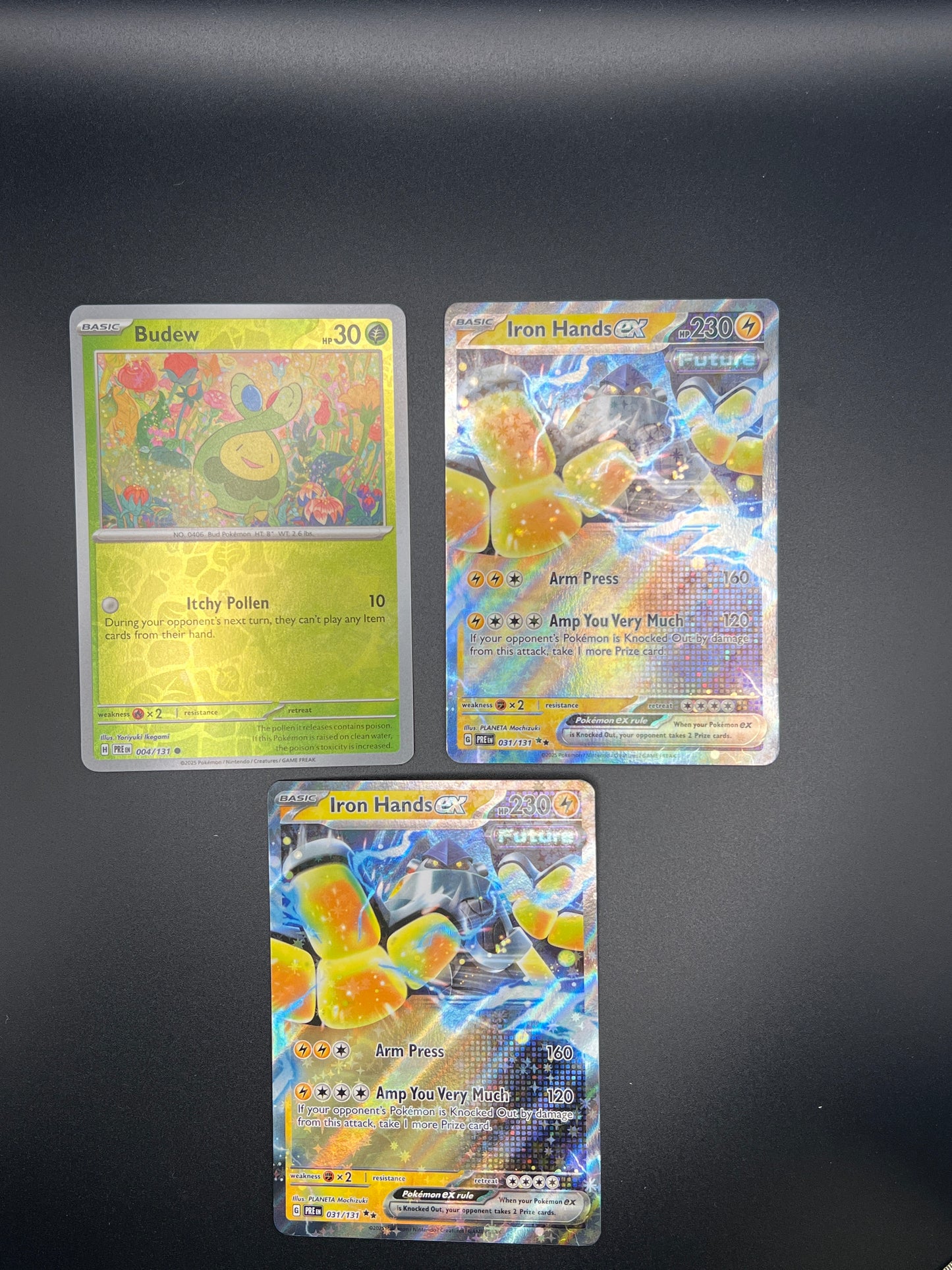 Auction Lot 399: Pokemon Cards Lot of 3 Budew Iron Hands EX Prismatic Evolutions Conditions Vary