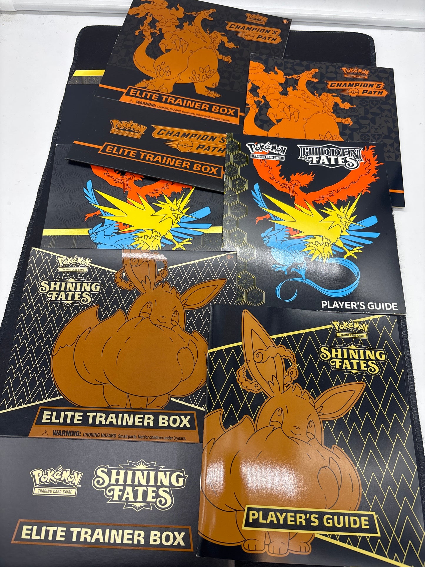 Auction Lot 290: Pokemon Card EMPTY Hidden Fatees & Shining Fates ETB Manual & Cover