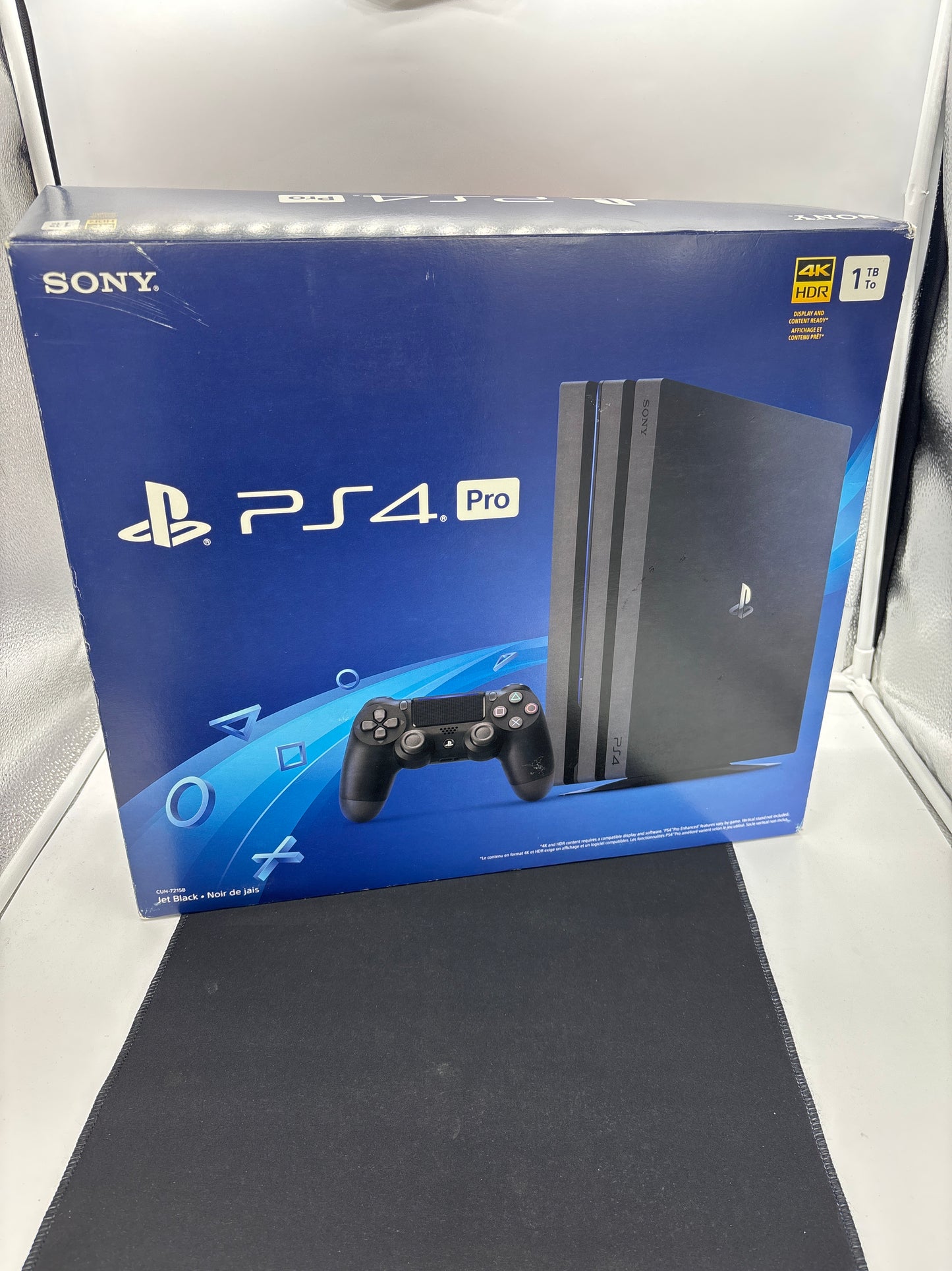 Auction Lot 1: PlayStation 4 Pro Edition 1K TB Working with Cords and Controller Missing Controller Charger