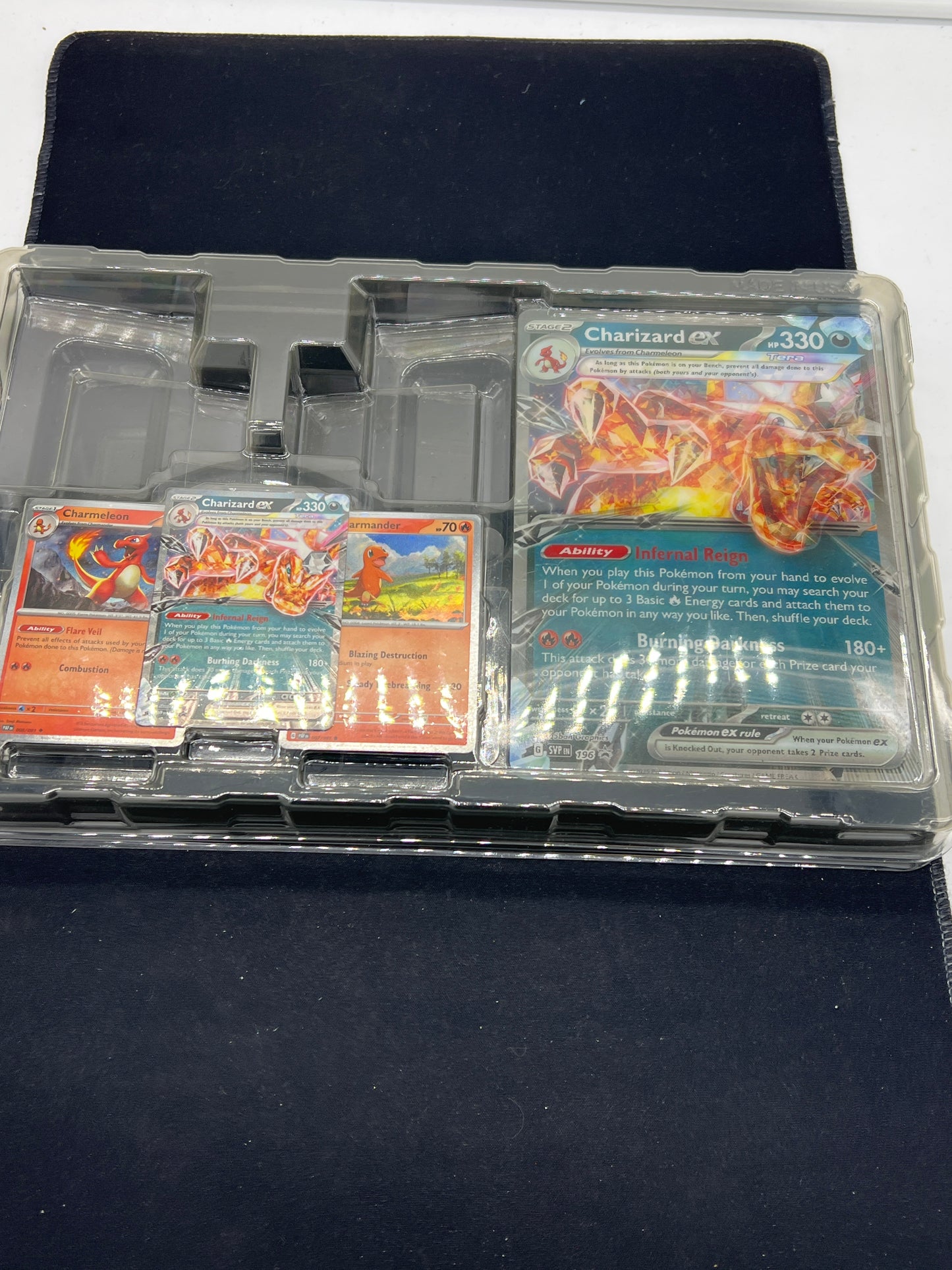 Auction Lot 149: Pokemon Cards Charizard EX Lenticular Jumbo & Lot of 3 Promos Conditions Vary
