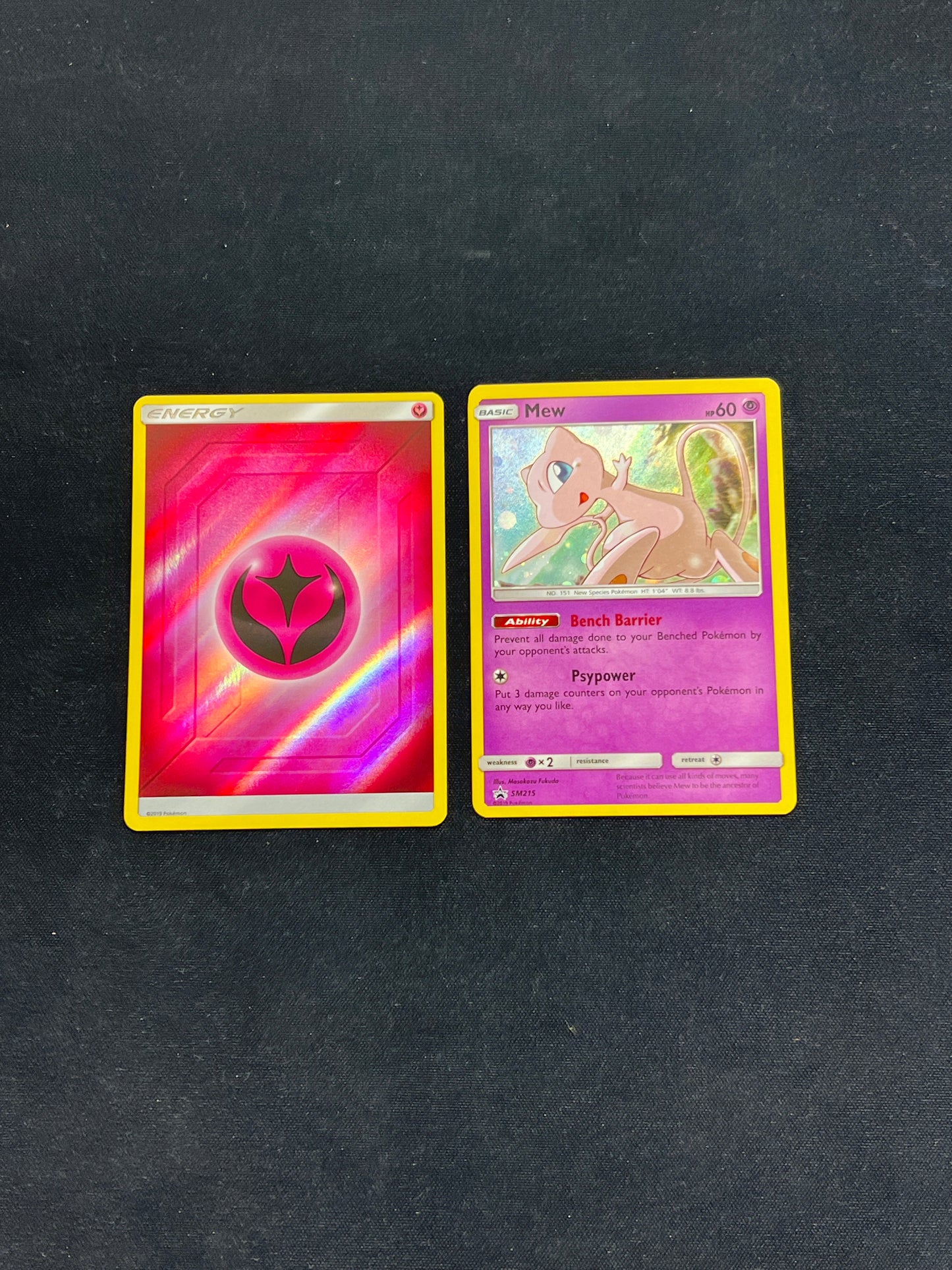 Auction Lot 57: Pokemon Cards Lot of 2 Mew SM Promo & Fairy Energy Holo Condition Vary