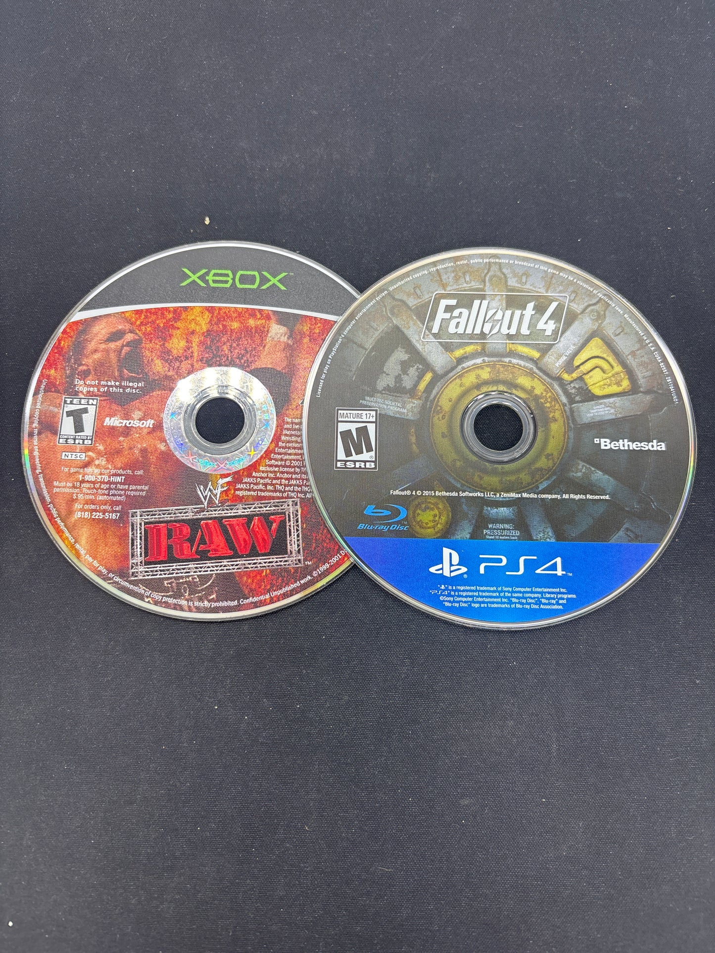 Auction Lot 127: Lot of 2 Loose Video Game WWE XBOX Fallout 4 PS4