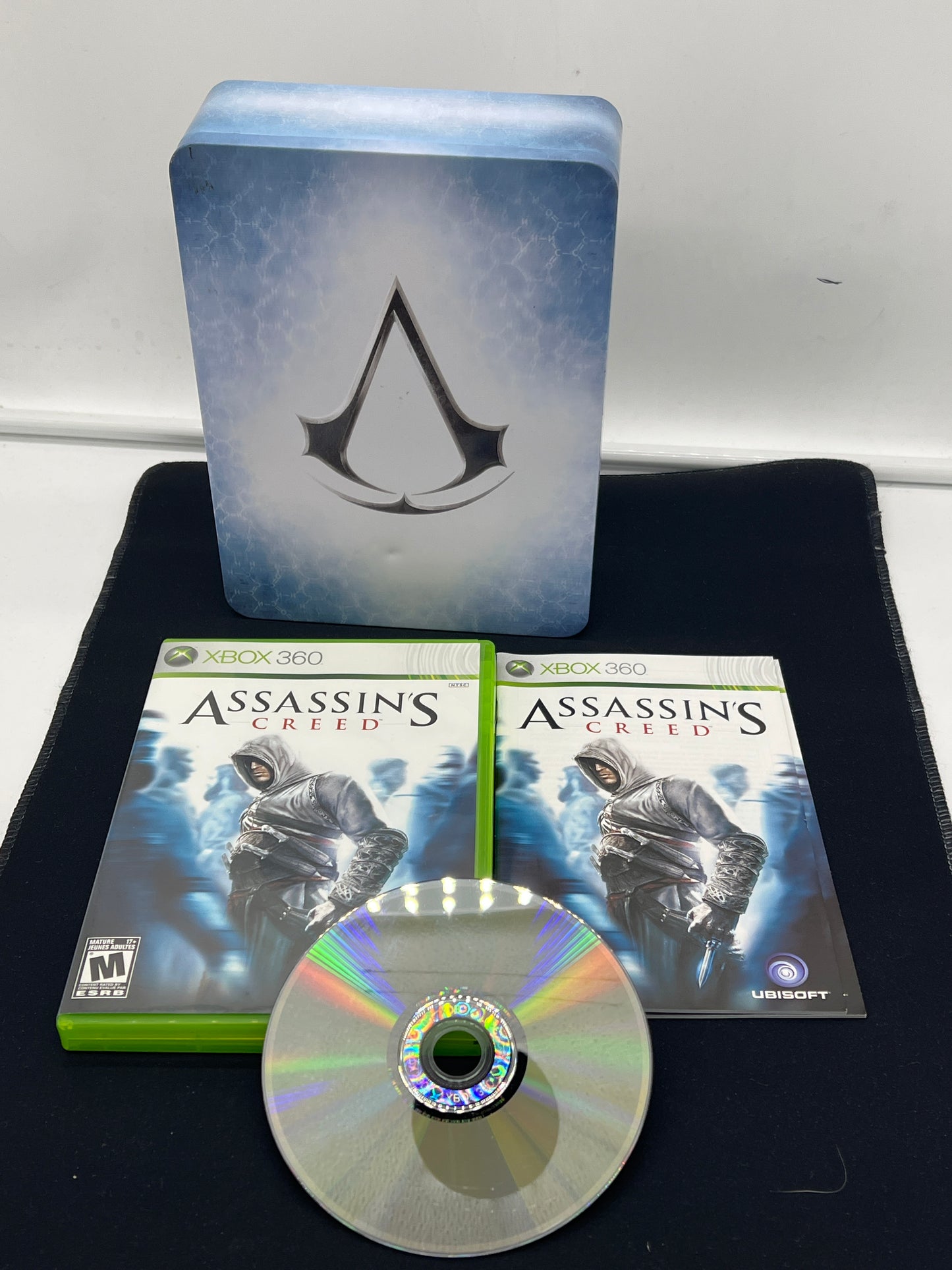 Auction Lot 111: XBOX 360 Video Game Assassin's Creed Steel Case Edition CIB