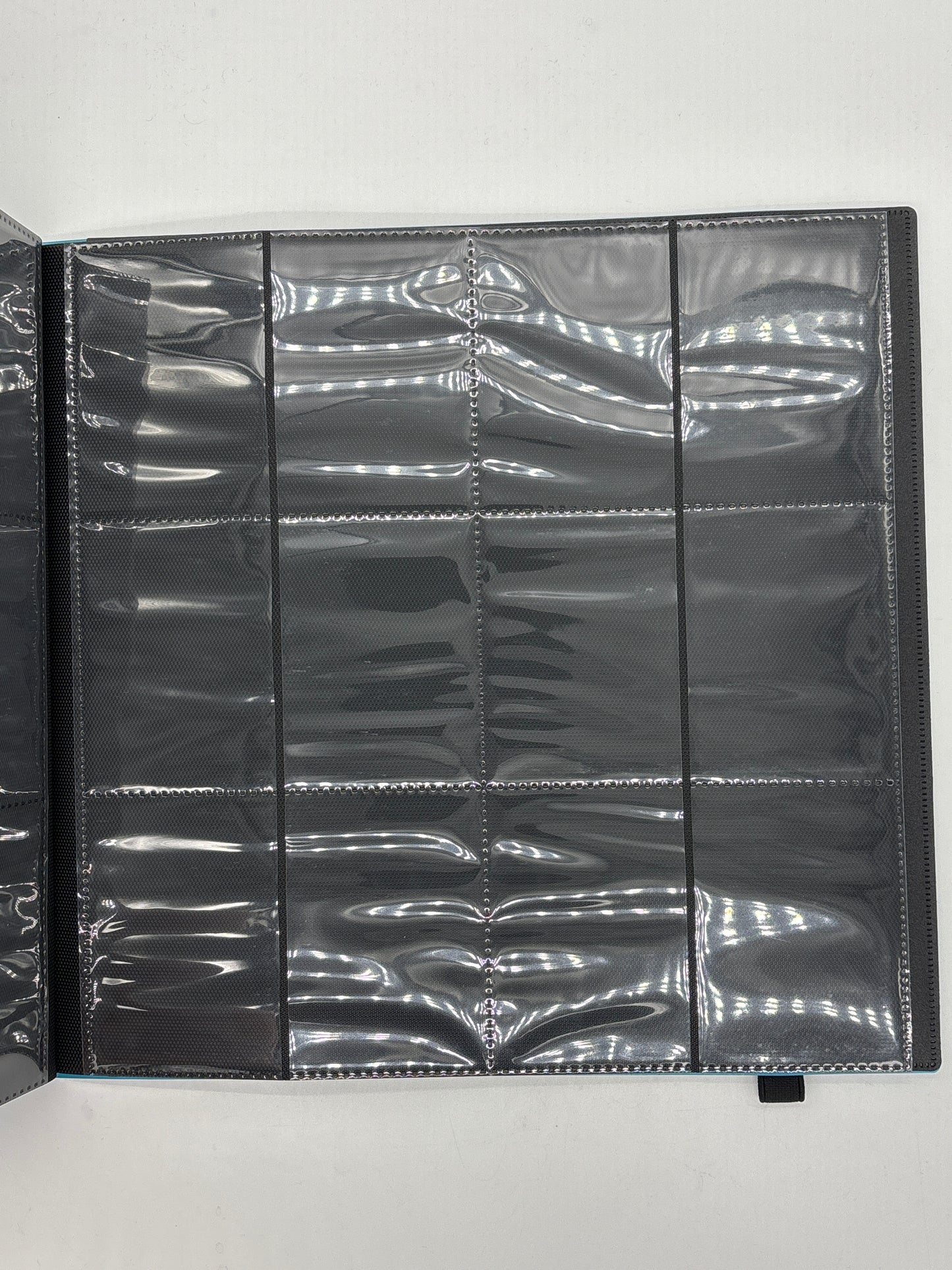Auction Lot 20: Ultrapro Plastic 12 Pocket Binder Zip Up Lightly Used