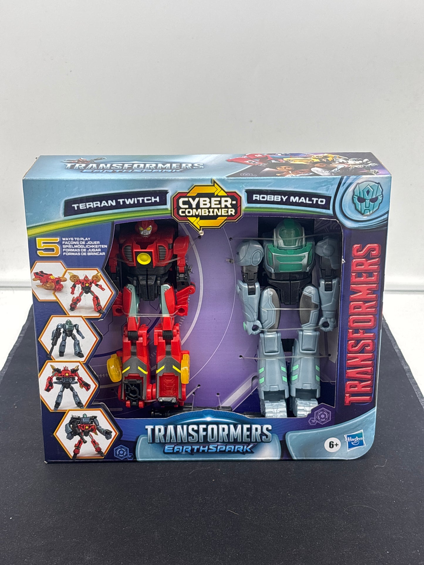 Auction Lot 248: Transformers Earthspark Terran Twitch and Robby Malto Figures SEALED