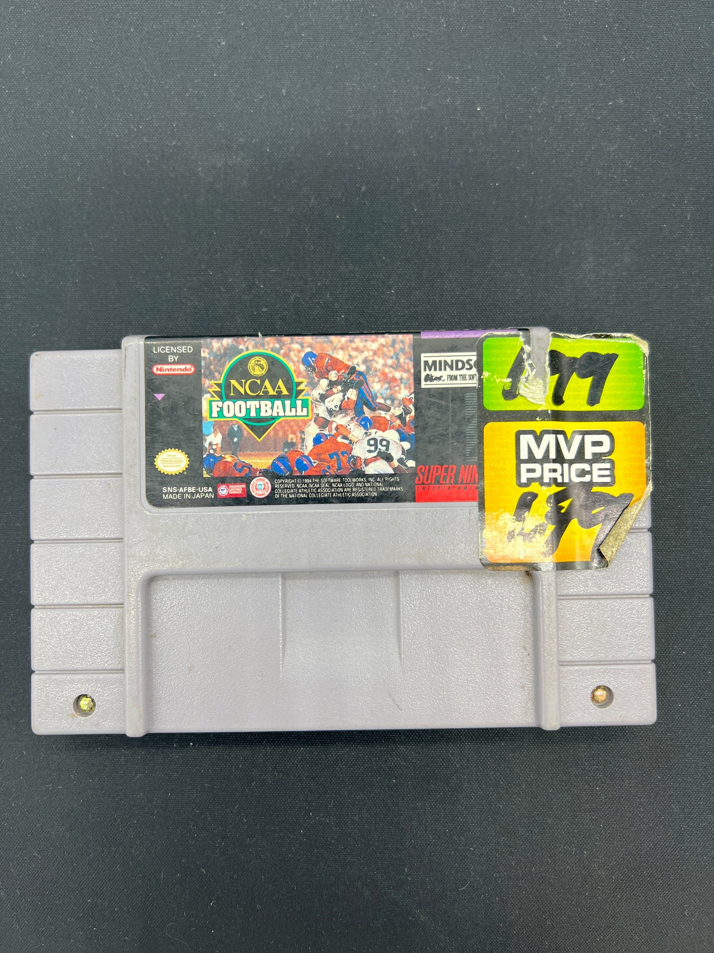 Auction Lot 92: SNES Video Game NCAA Football Loose