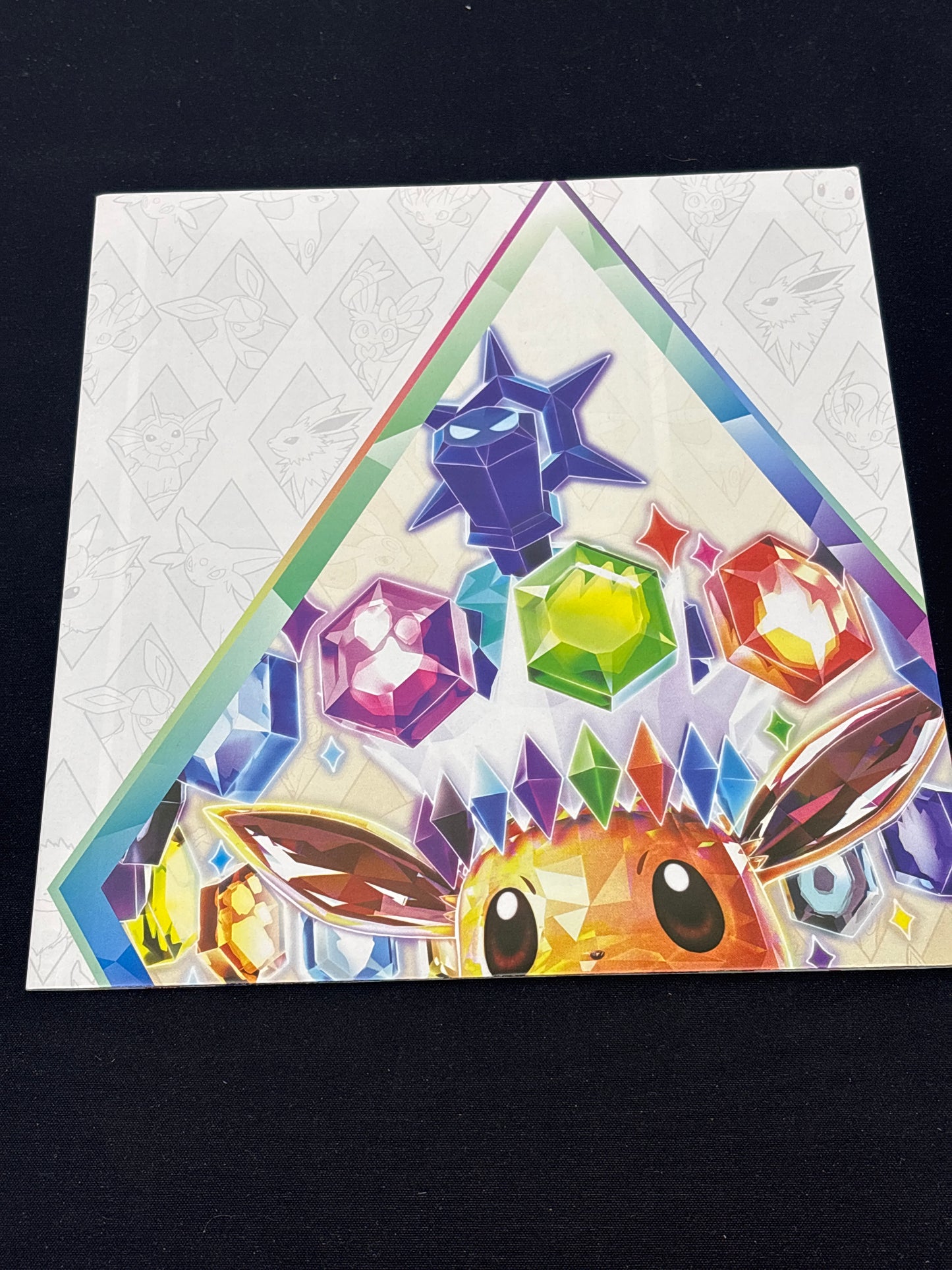 Auction Lot 98: Pokemon Prismatic Evolutions Loose Poster Lot 2