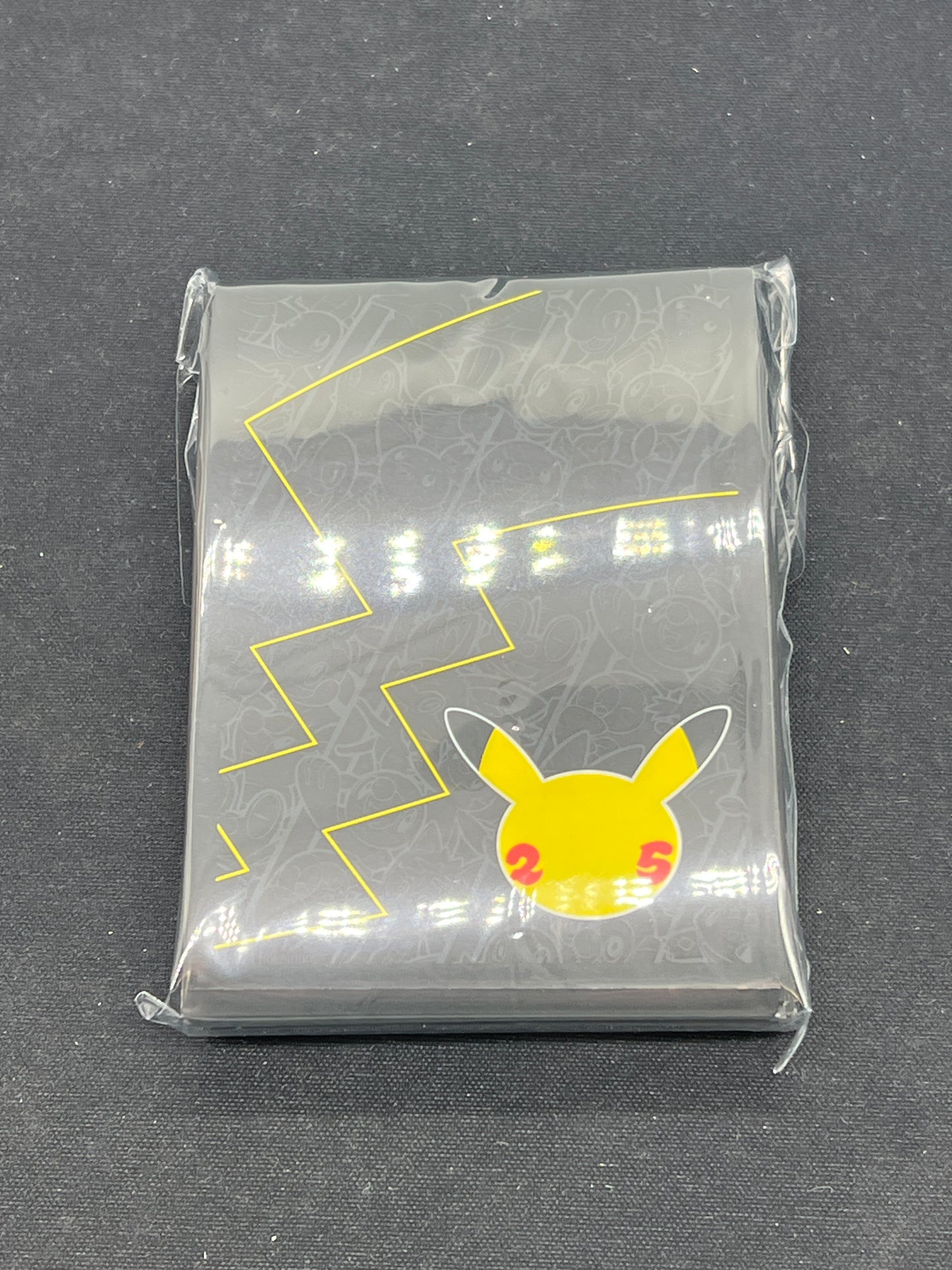 Auction Lot 189: Pokemon Celebrations ETB Sleeves Unused