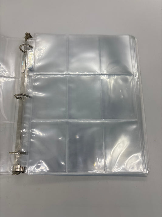 Auction Lot 100: White 3 Ring Binder  With 9 Pocket Pages Lightly Used