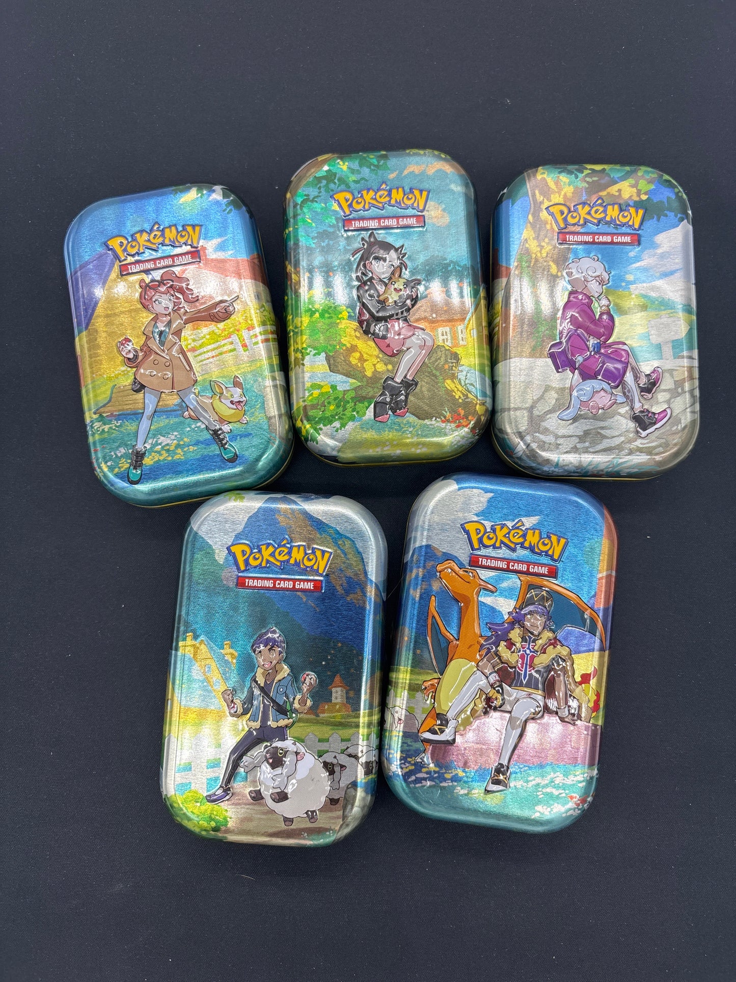 Auction Lot 97: Pokemon SWSH Collection Tins Loose