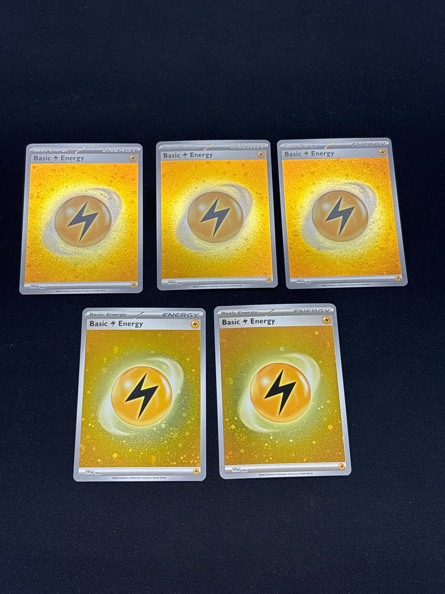 Auction Lot 57: Pokemon Electric Holo Energy Card Lot Conditions Vary