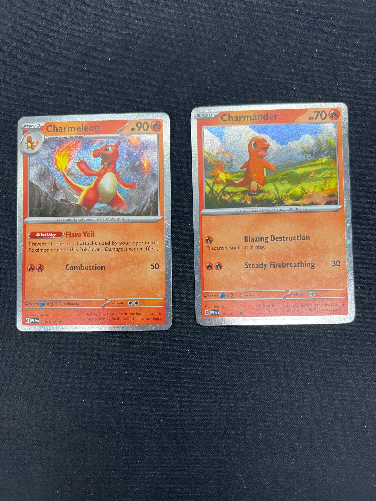 Auction Lot 347: Pokemon Cards Charmeleon & Charmander Cosmo Holos SV Promo Conditions Vary
