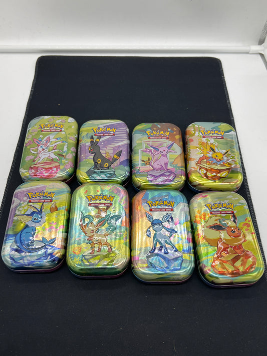 Auction Lot 97: Pokemon Cards Prismatic Evolutions Tins EMPTY Lot 2