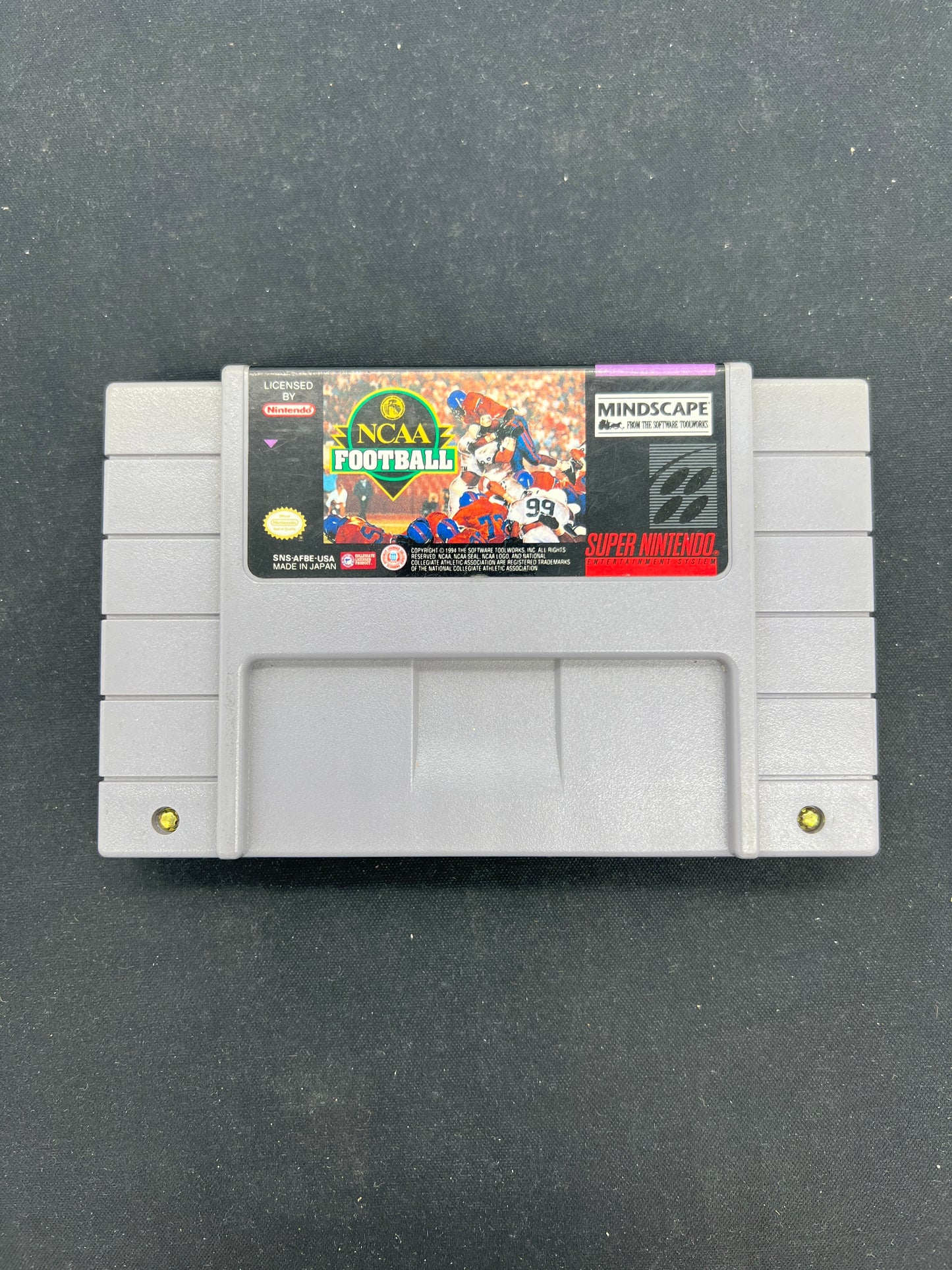 Auction Lot 169: SNES Video Game NCAA Football Loose