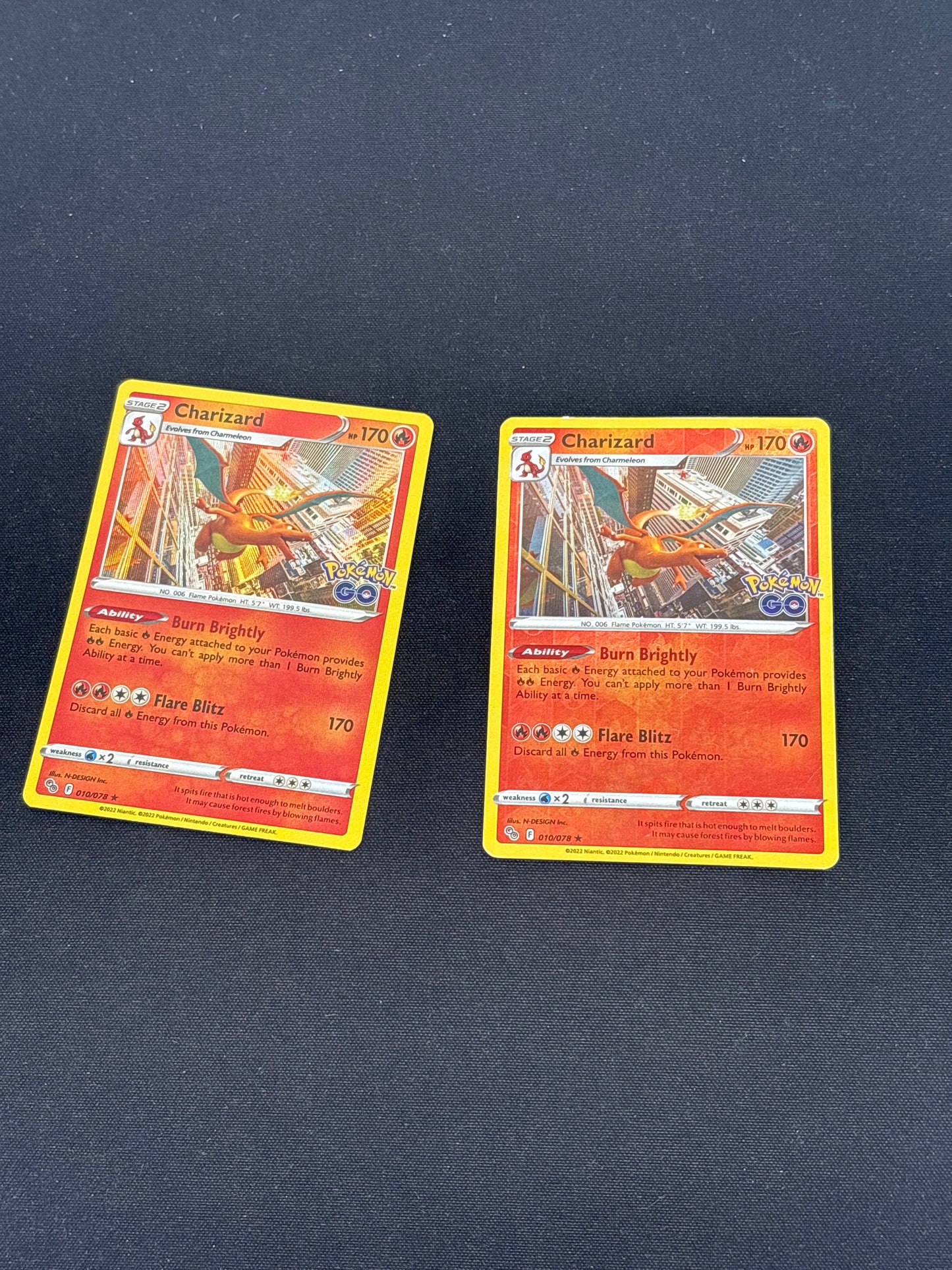Auction Lot 481: Pokemon Cards Charizard Pokemon Go Reverse & Holo Rare Condition Vary