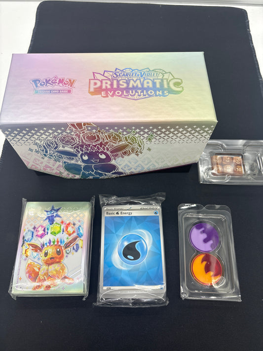 Auction Lot 335: Pokemon Pristmatic Evolutions Empty ETB With Contents and Card Sleeves