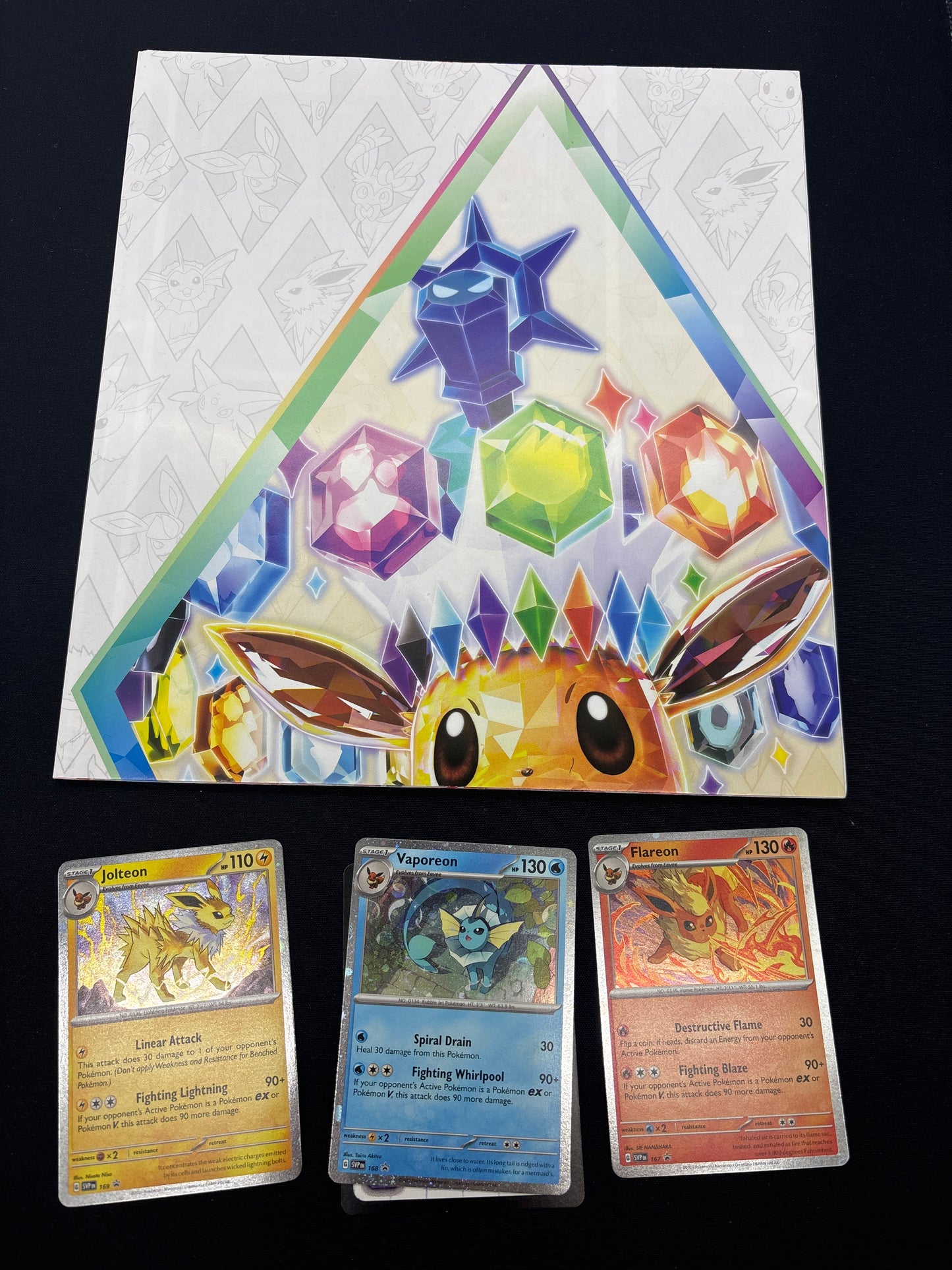 Auction Lot 220: Pokemon Cards Prismatic Evolutions Poster Collection Lot 1 Conditions Vary