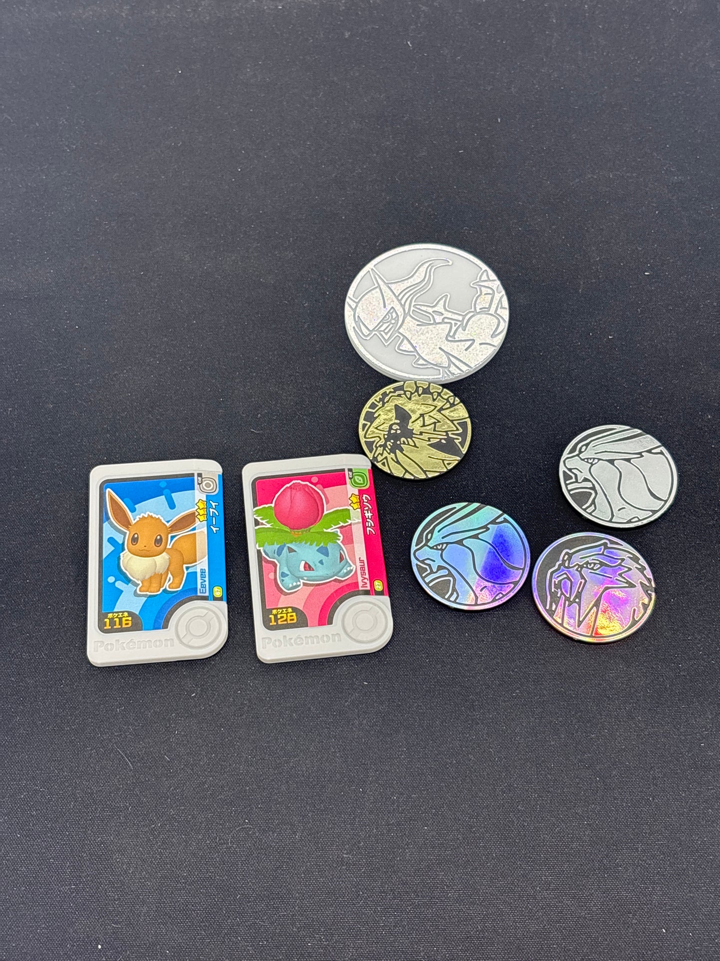 Auction Lot 87: Pokemon Assorted Coins and Toys Lot