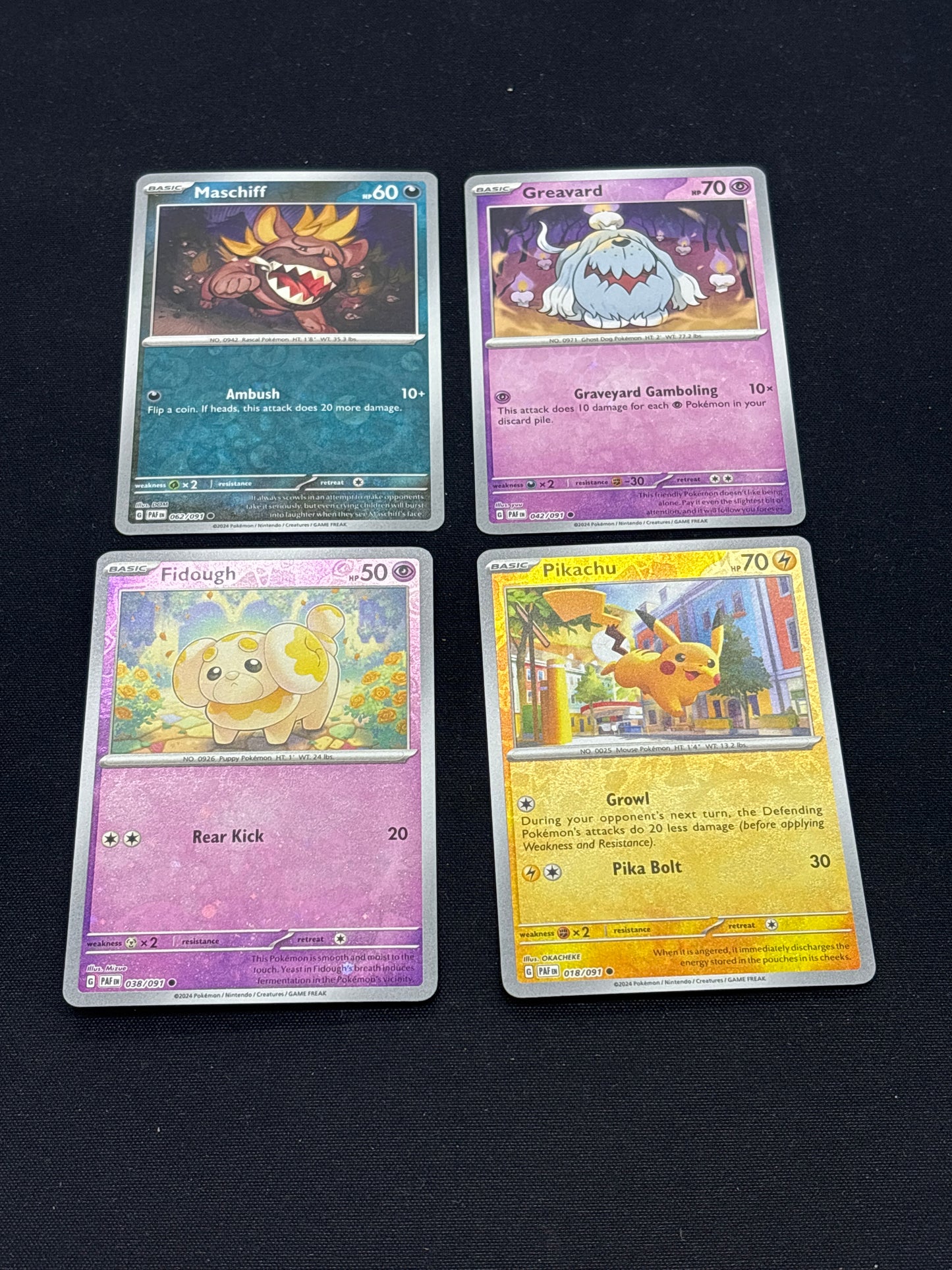 Auction Lot 319: Pokemon Cards Lot of 4 Paldean Fates Tin Promos Conditions Vary