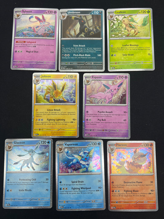 Auction Lot 34: Pokemon Cards Prismatic Evolutions 8 pack Tin Cosmo Holo Eeveelutions Lot 2 Conditions Vary
