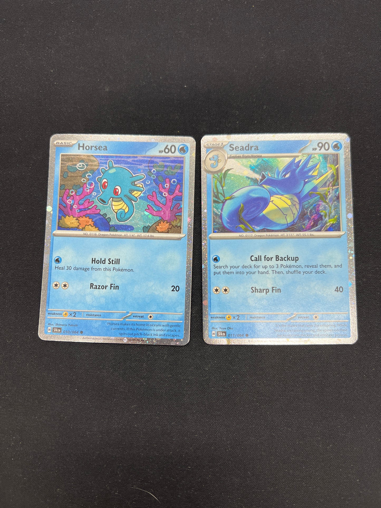 Auction Lot 118: Pokemon Cards Horsea & Seadra Cosmo Holos SV Promos Conditions Vary