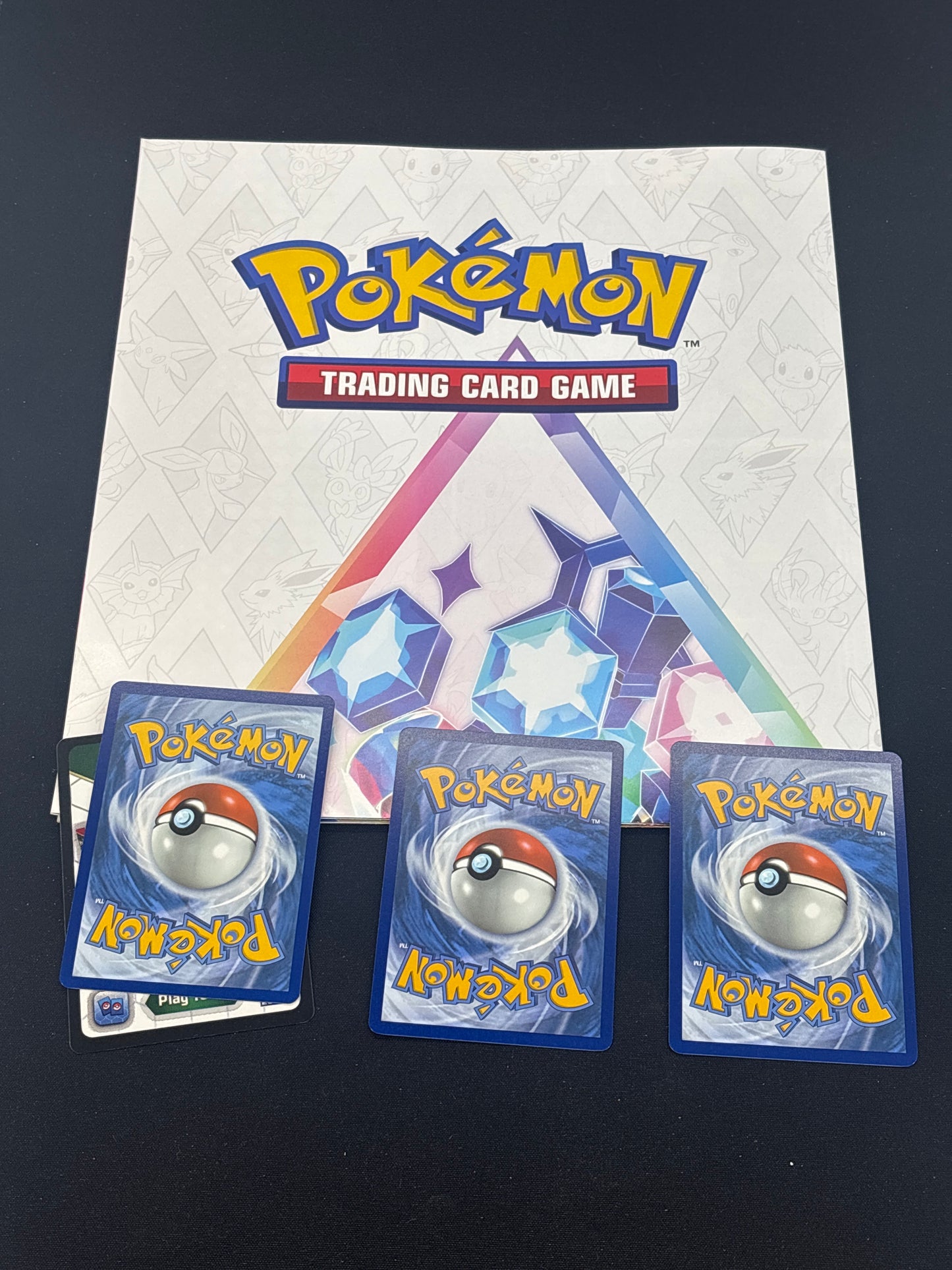 Auction Lot 63: Pokemon Prismatic Evolutions Poster & 3 Promo Card Lot Conditions Vary