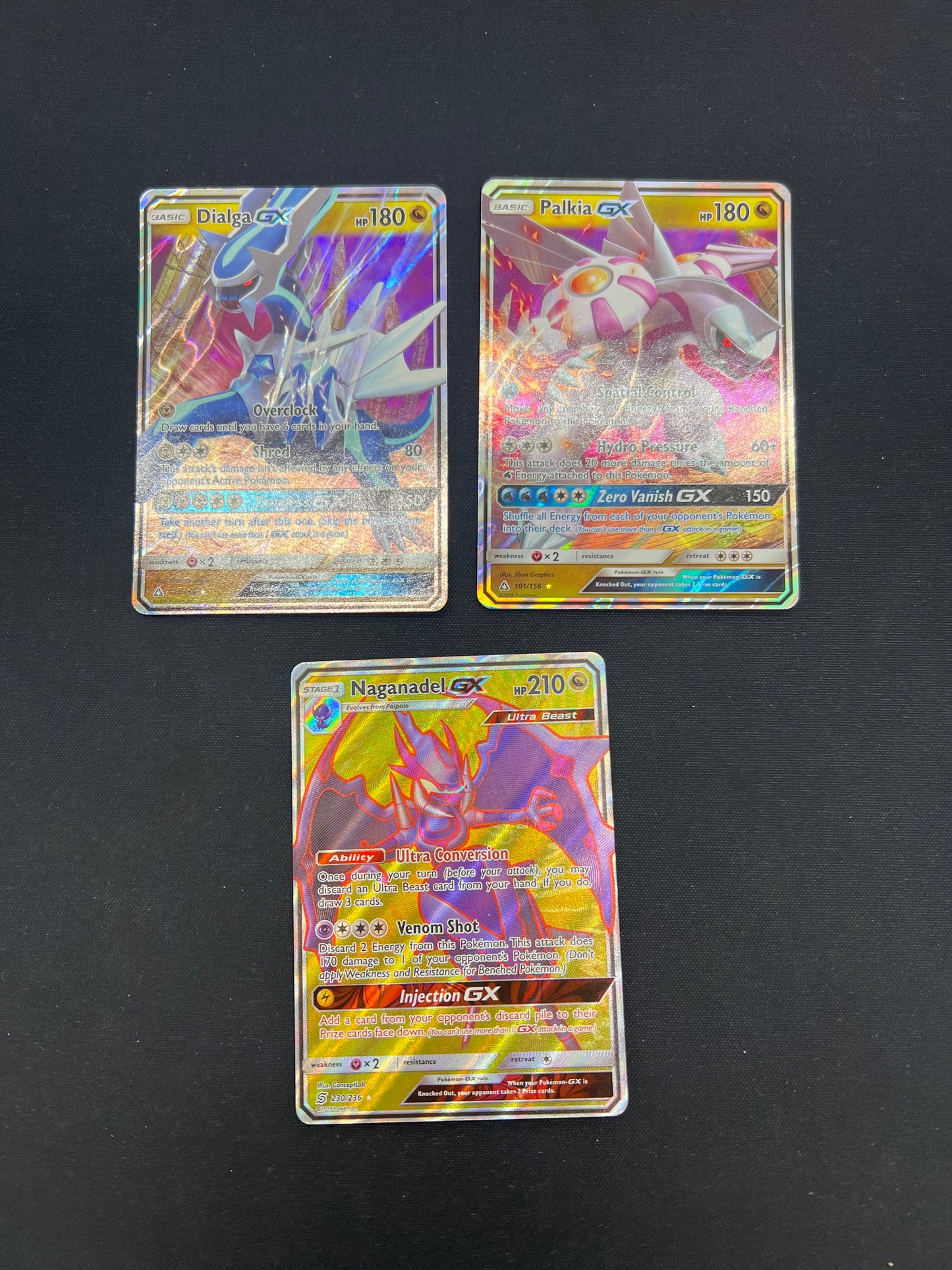Auction Lot 214: Pokemon Cards Assorted Lot of 3 Dragon Type GX Full Arts Dialga Palkia Naganadel GX Conditions Vary
