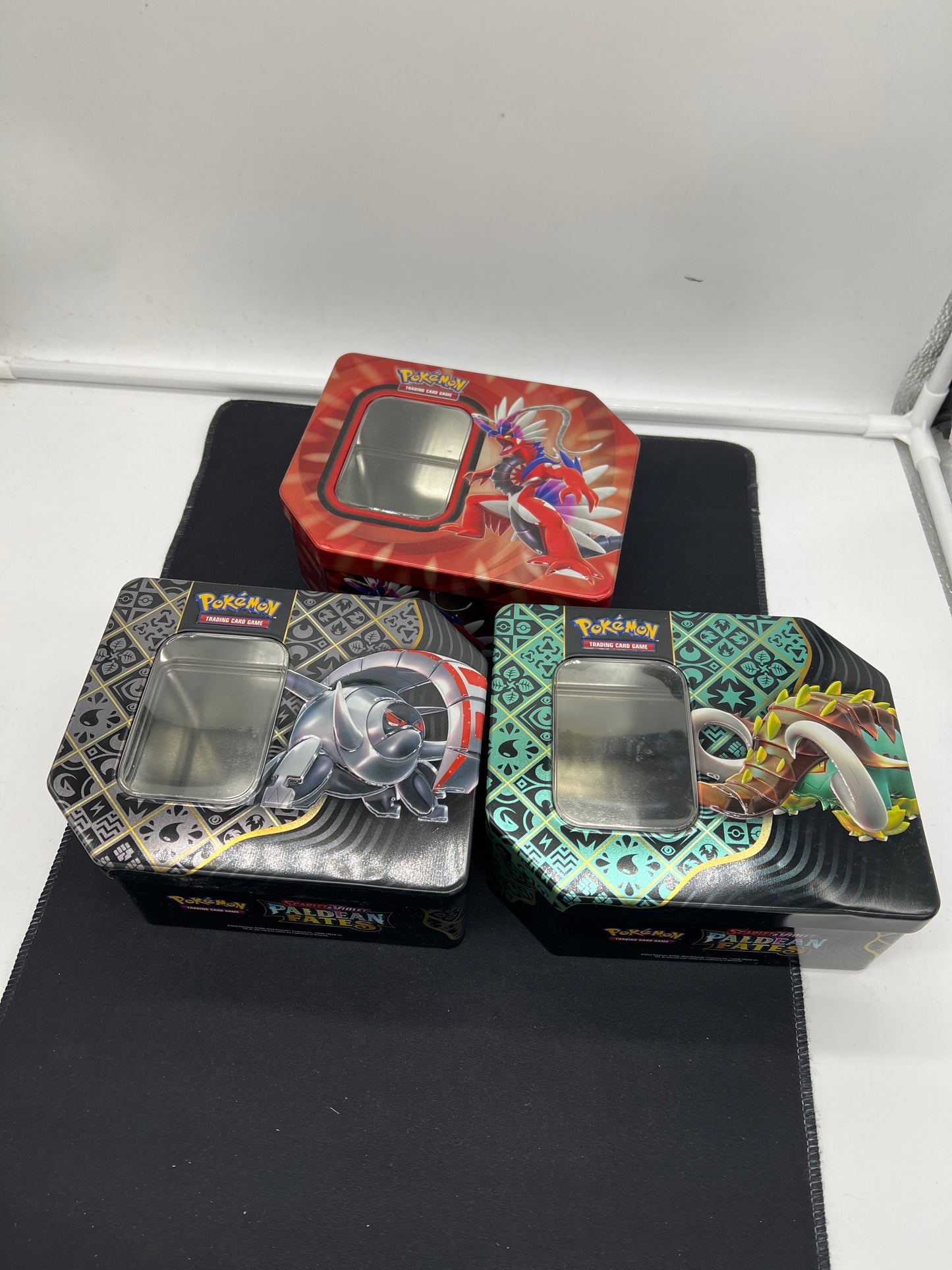 Auction Lot 310: Pokemon Cards Paldean Fates Tins EMPTY Set of 3