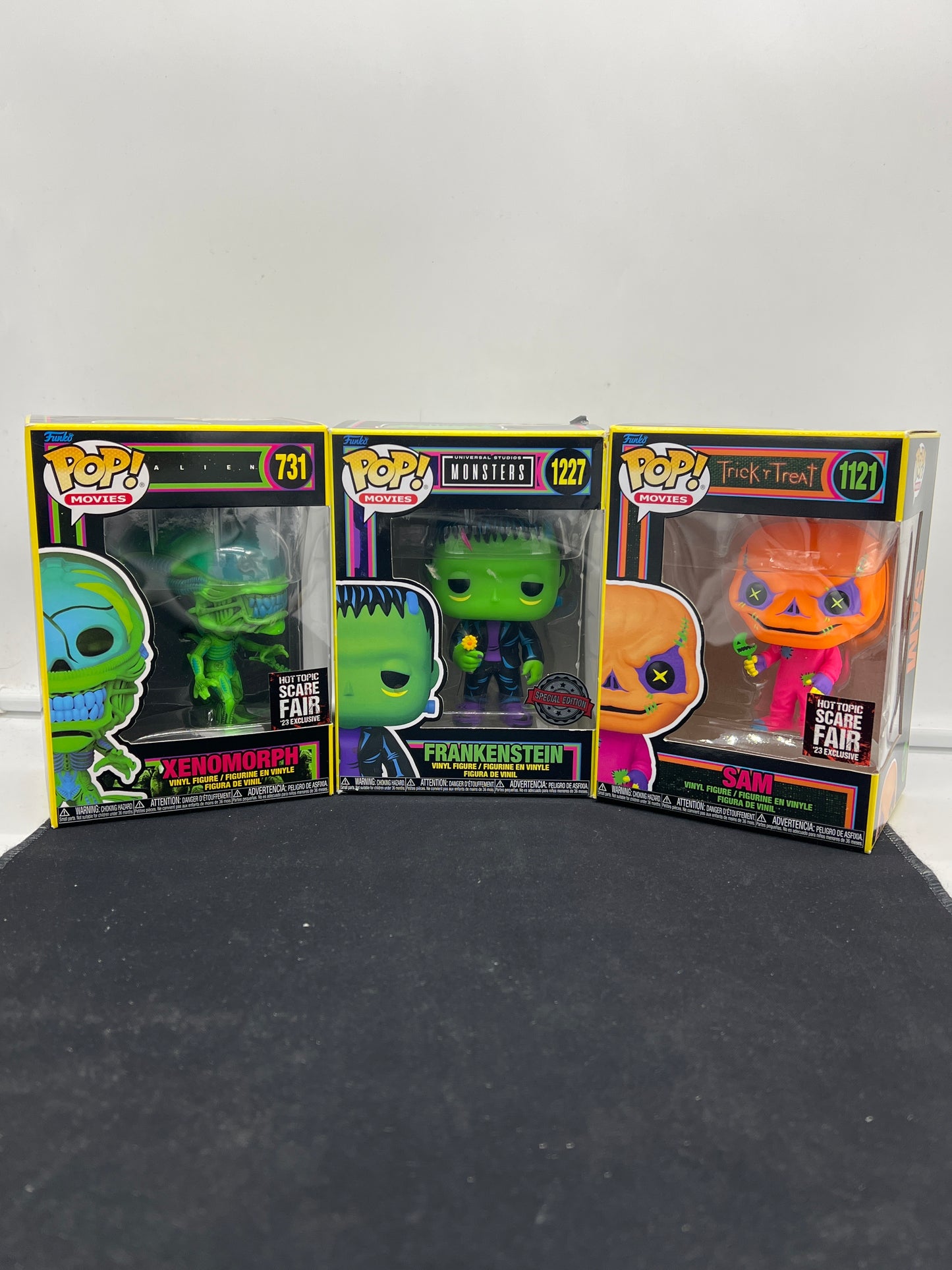 Auction Lot 32: POP Funko Lot of 3 Blacklight Characters Xenomorph Frankenstein Sam 731 1227 1121 Figures