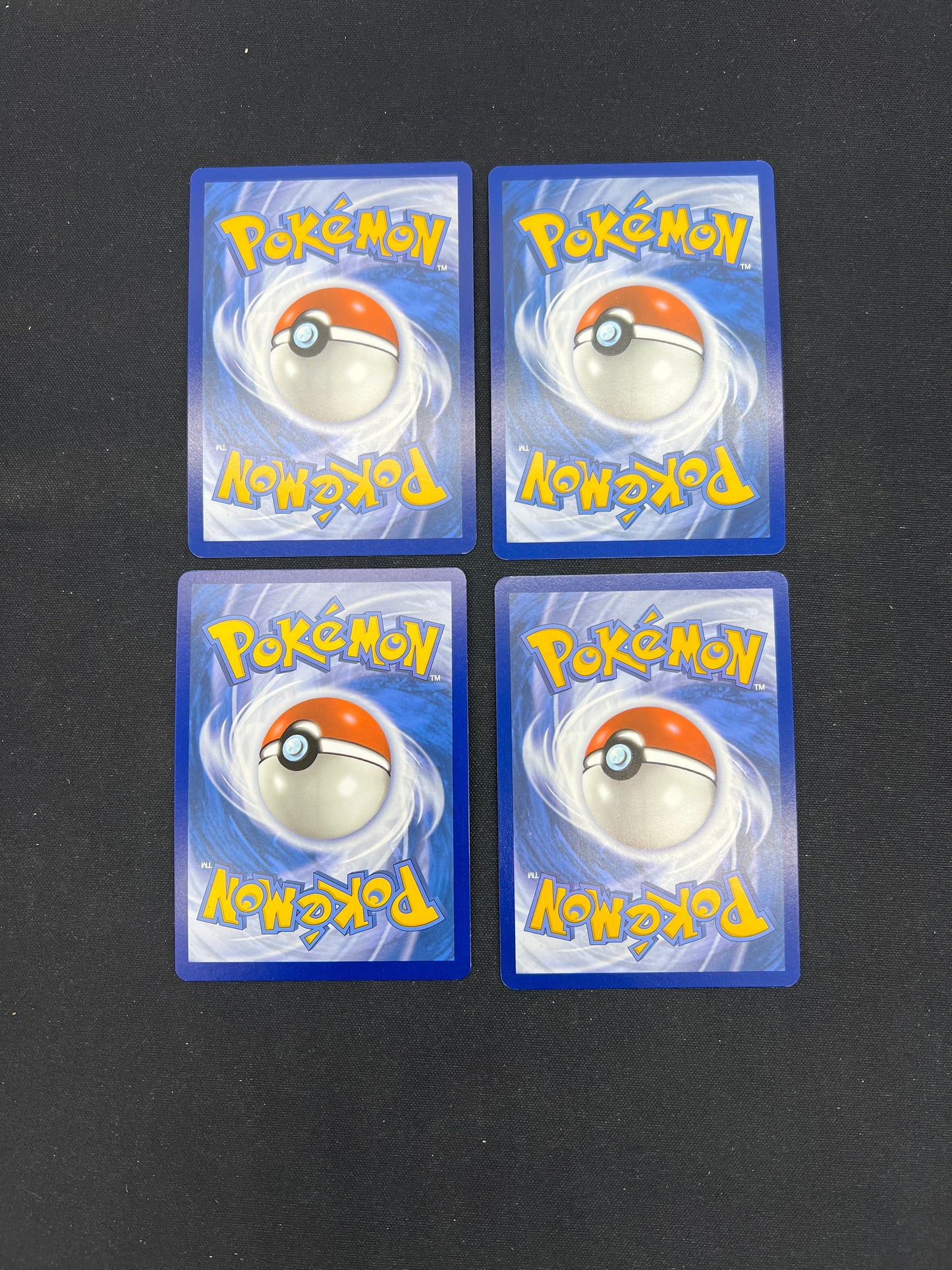 Auction Lot 269: Pokemon Cards Lot of 4 Assorted Cosmo Holos SV Conditions Vary