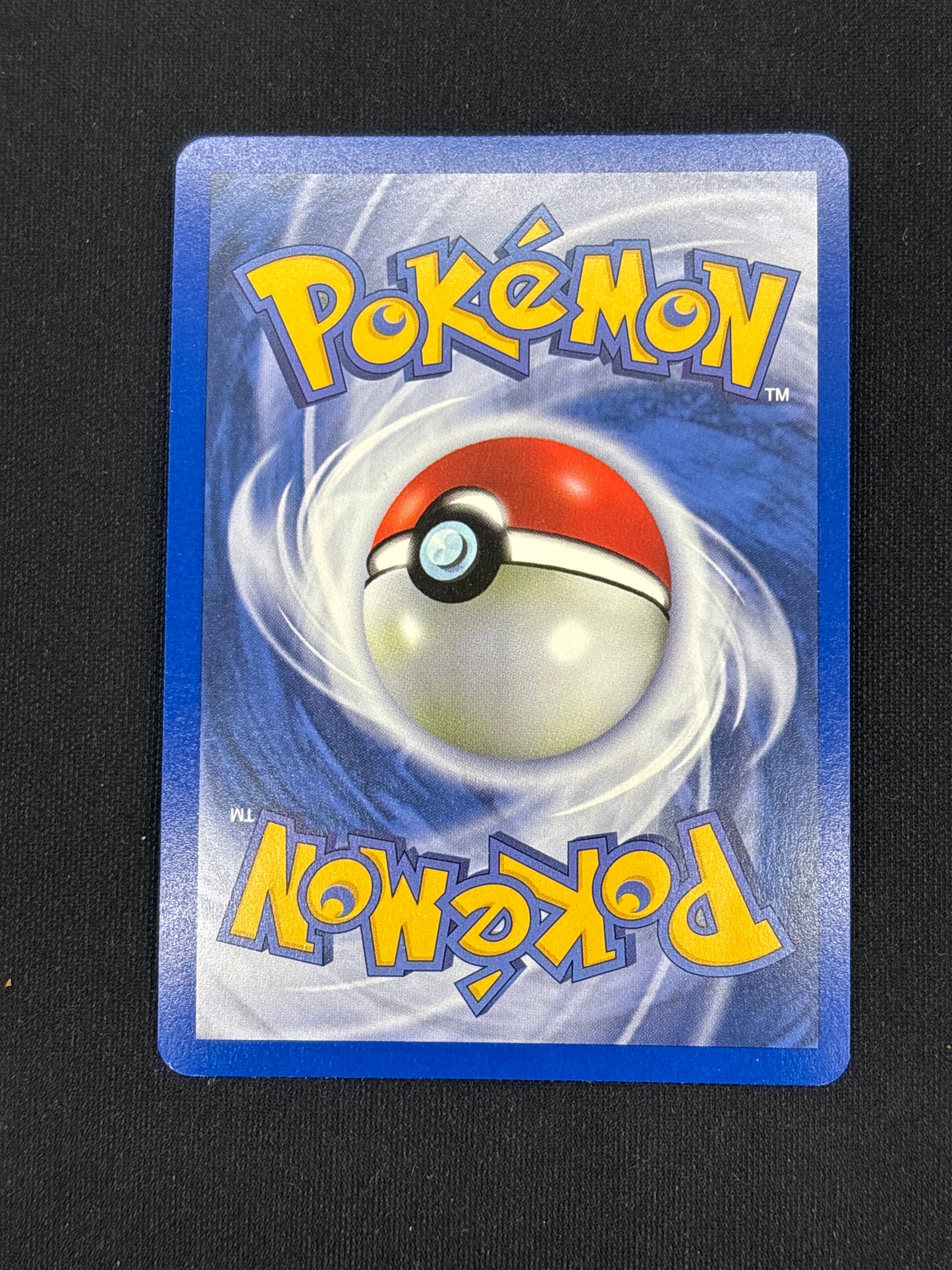 Auction Lot 35: Togetic Holo Pokemon Team Rocket Returns Conditions Vary
