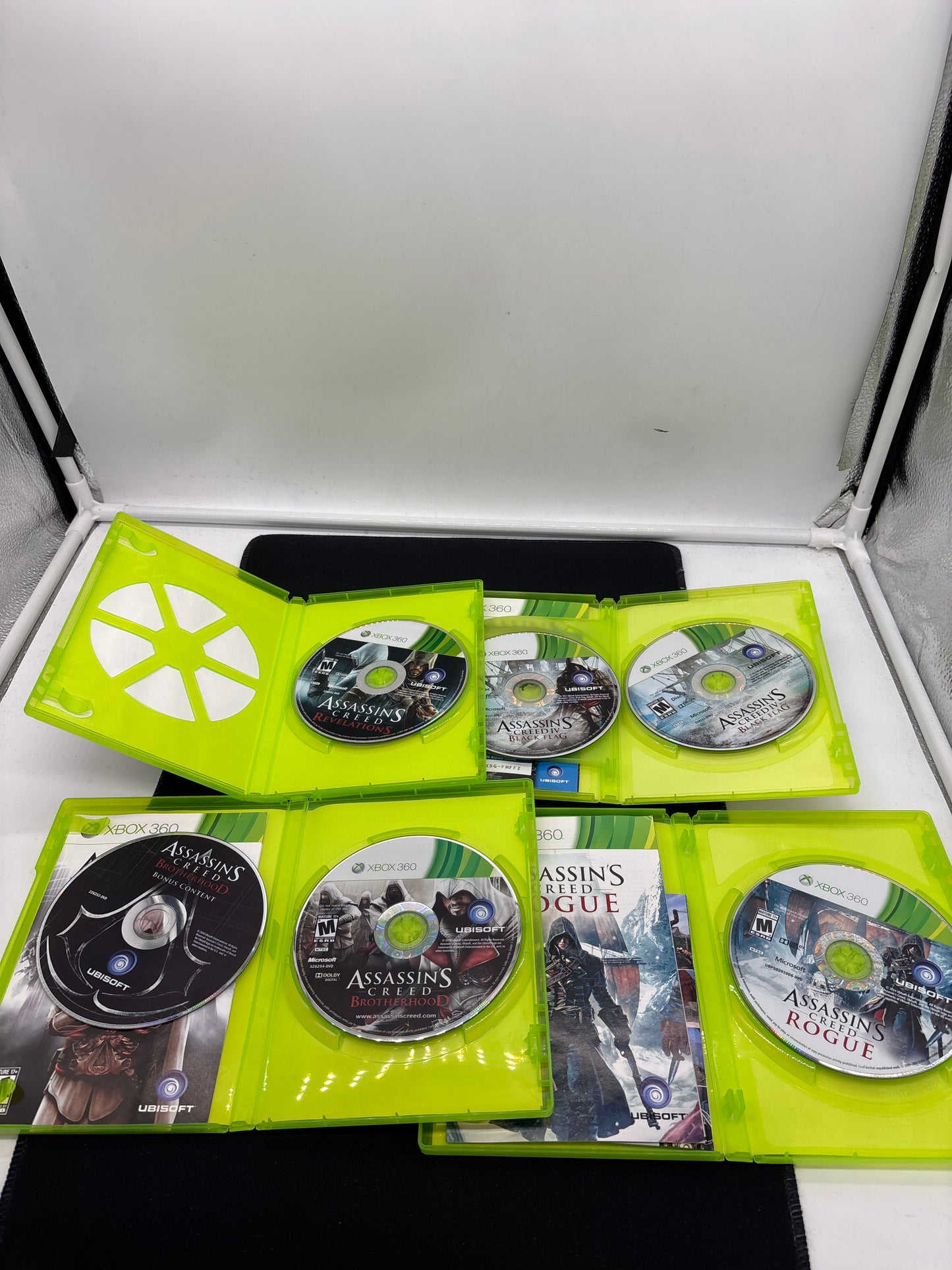 Auction Lot 103: XBOX 360 Video Game Lot of 4 Assassin's Creed Brotherhood Revelations Black Flag Rogue