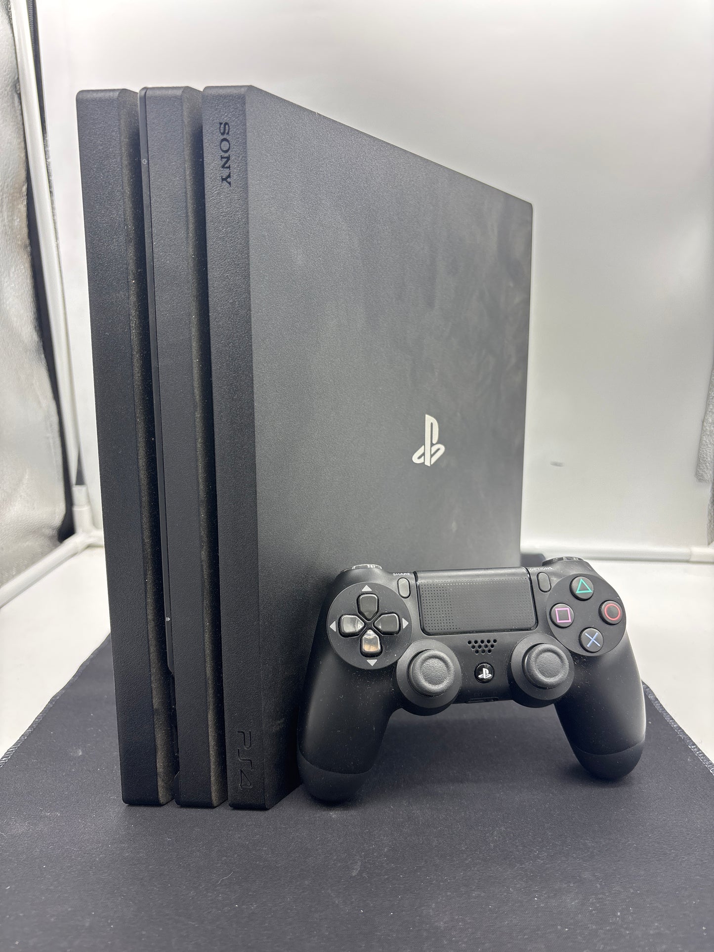 Auction Lot 1: PlayStation 4 Pro Edition 1K TB Working with Cords and Controller Missing Controller Charger