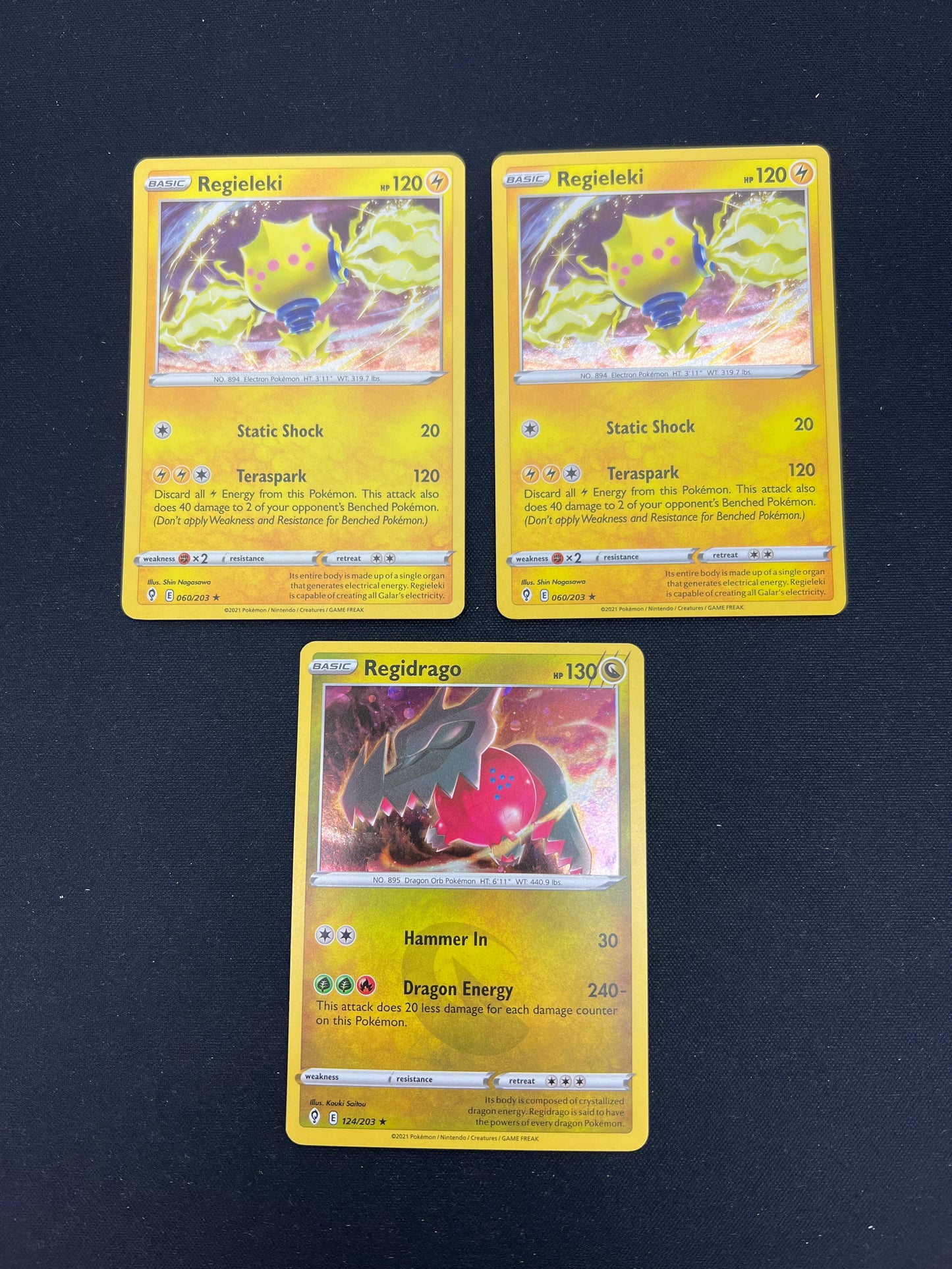 Auction Lot 238: Pokemon Cards Regieleki & Regidrago Cosmo Holo SWSH Promos Conditions Vary