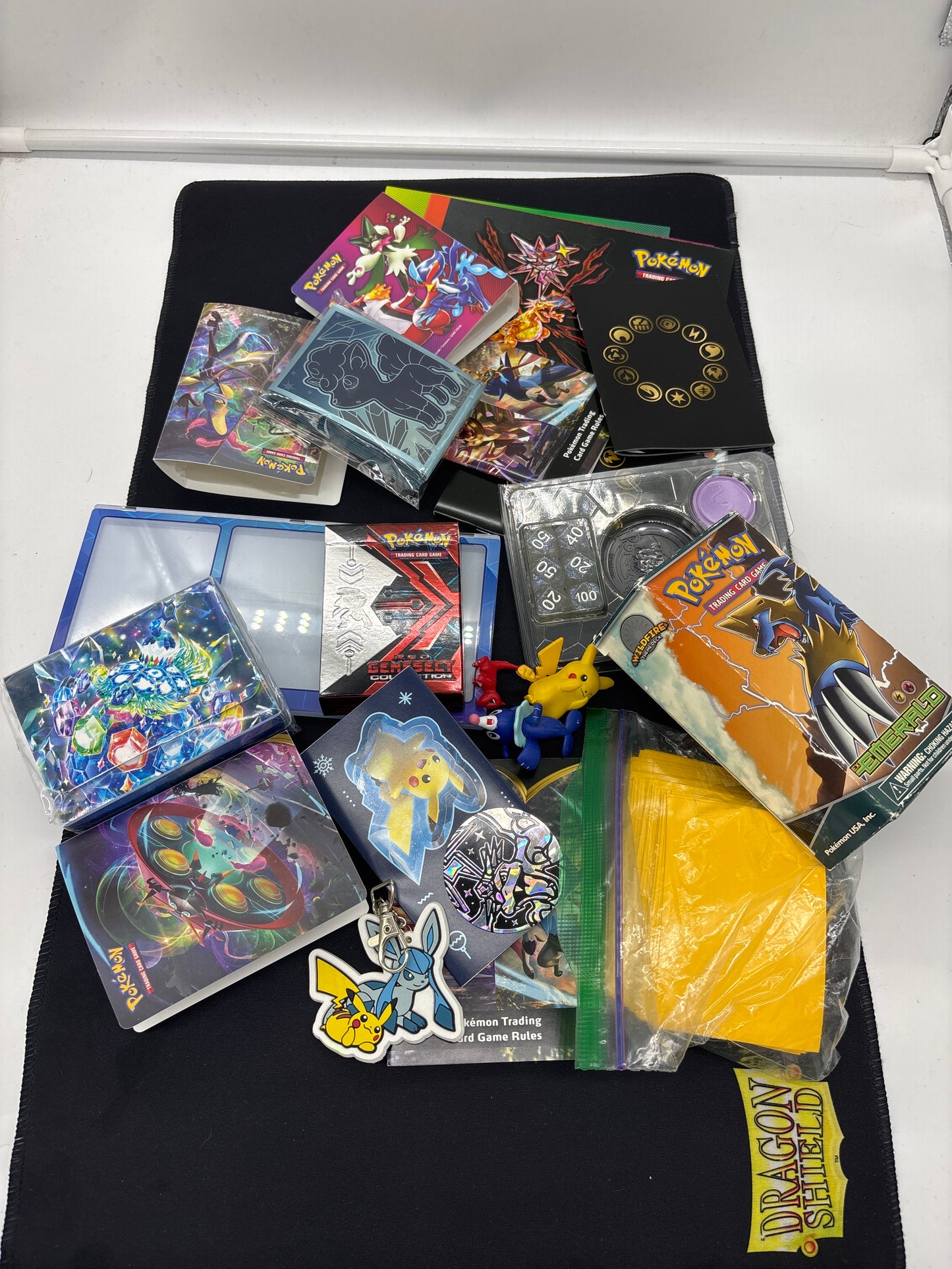 Auction Lot 324: Pokemon Accessories Stickers Mini Portfolio Empty Boxes Card Sleeves Lot