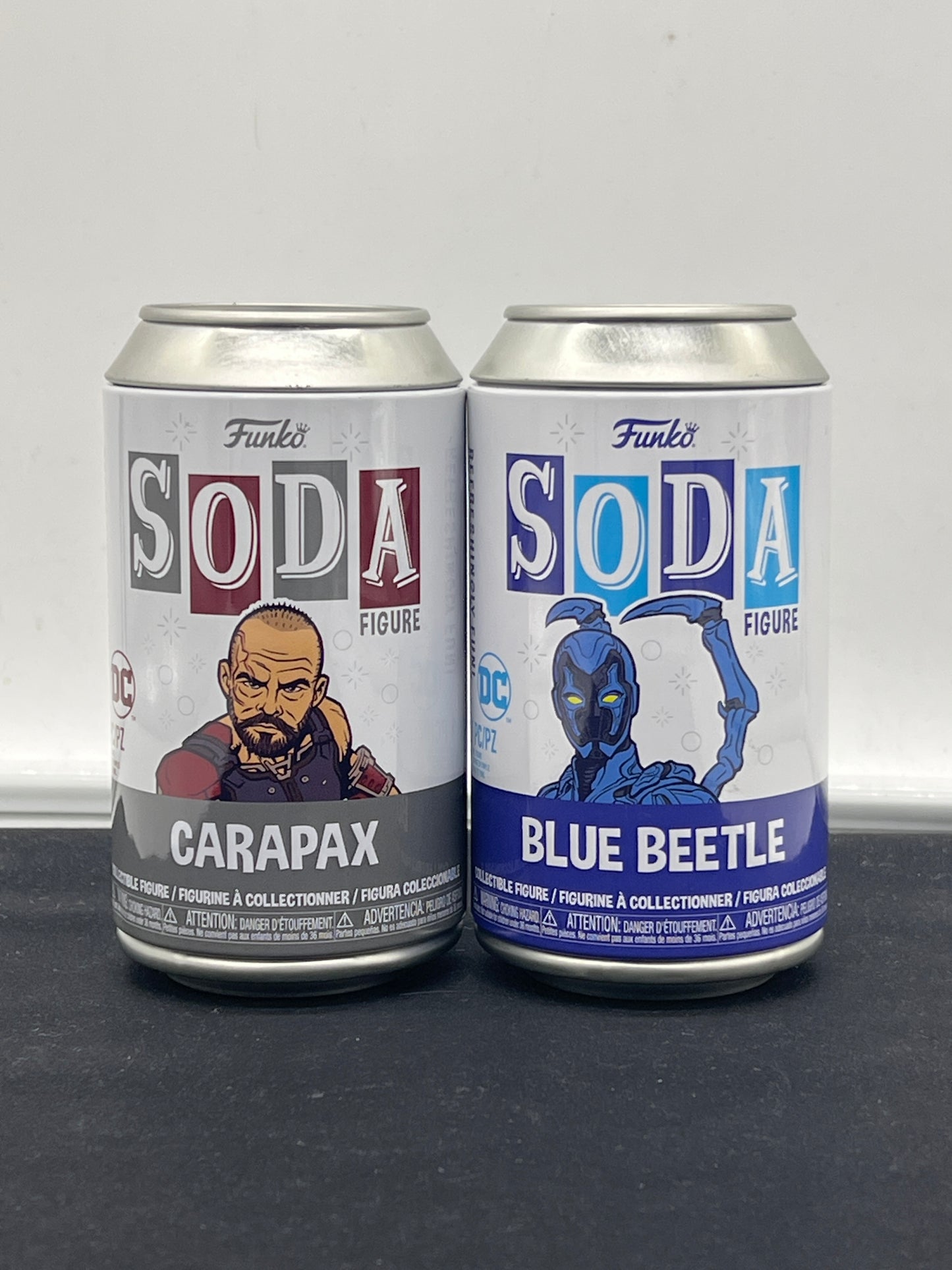 Auction Lot 43: Funko Soda Figures Lot of 2 Carapax Blue Beetle