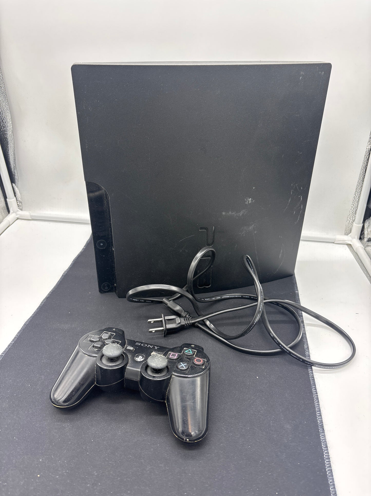 Auction Lot 19: Sony Playstation3 Console Slim Black Model