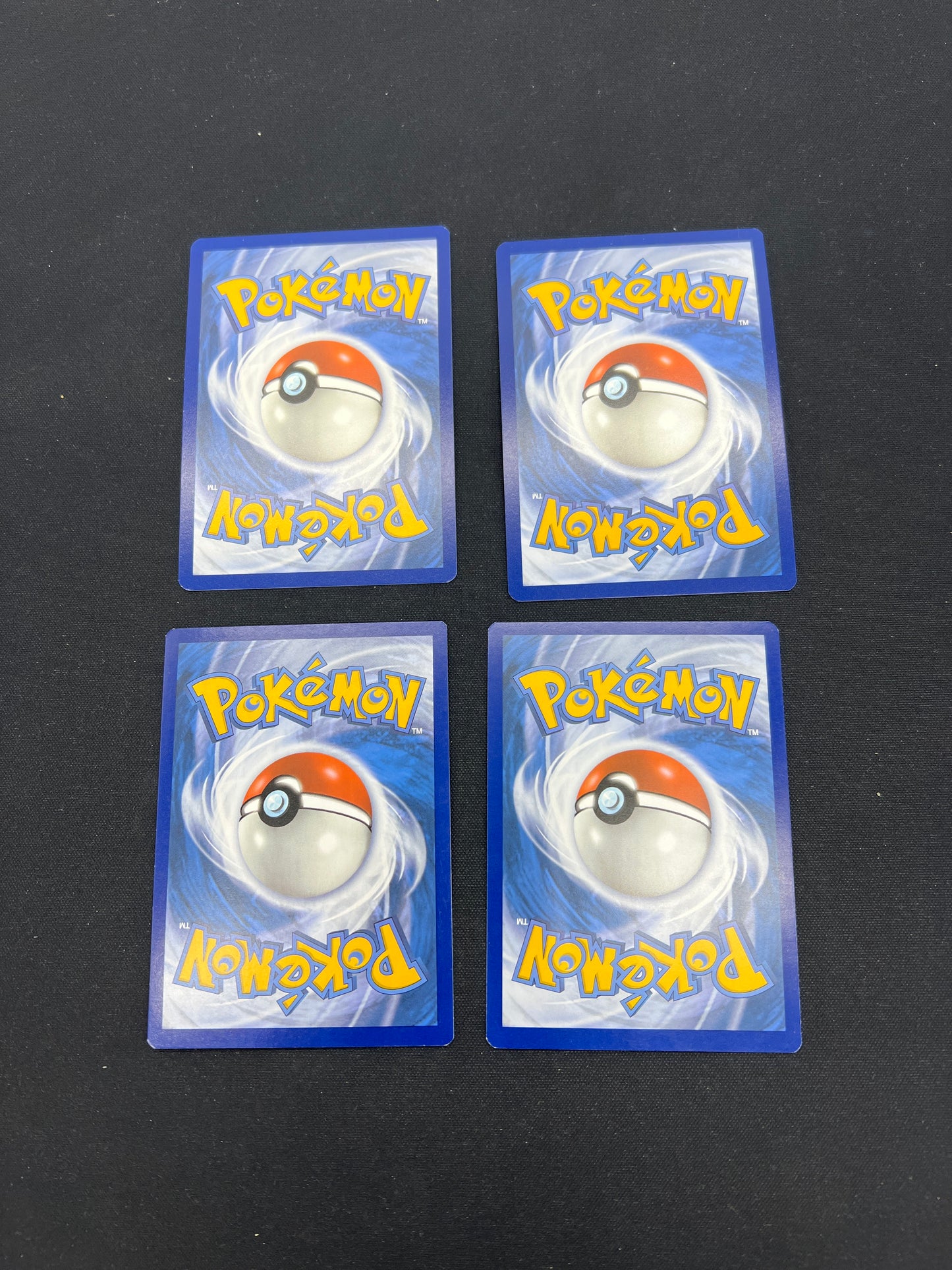 Auction Lot 359: Pokemon Cards Lot of 4 Charizard Holo Stamped Pokemon GO Conditions Vary