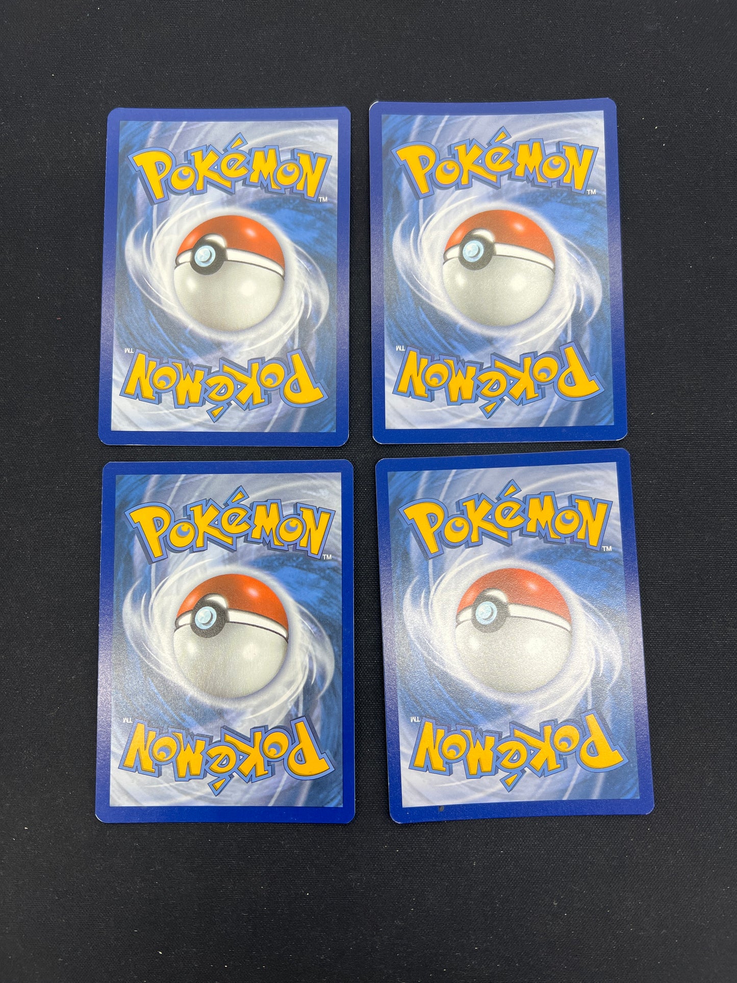 Auction Lot 120: Pokemon Cards Lot of 4 Assorted Eeveelutions Cosmo Holo SWSH Conditions Vary